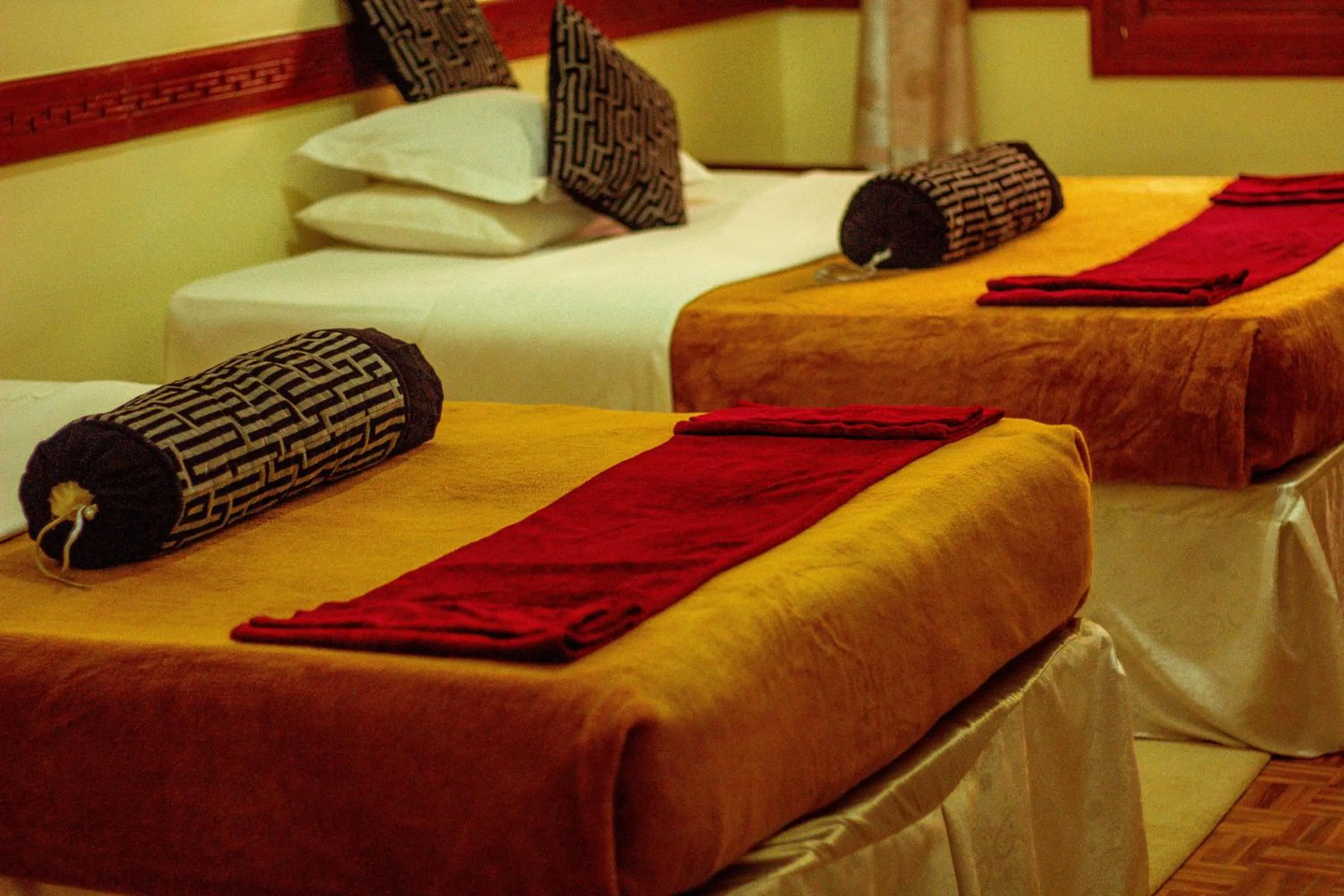 Bed in The Charity Hotel International