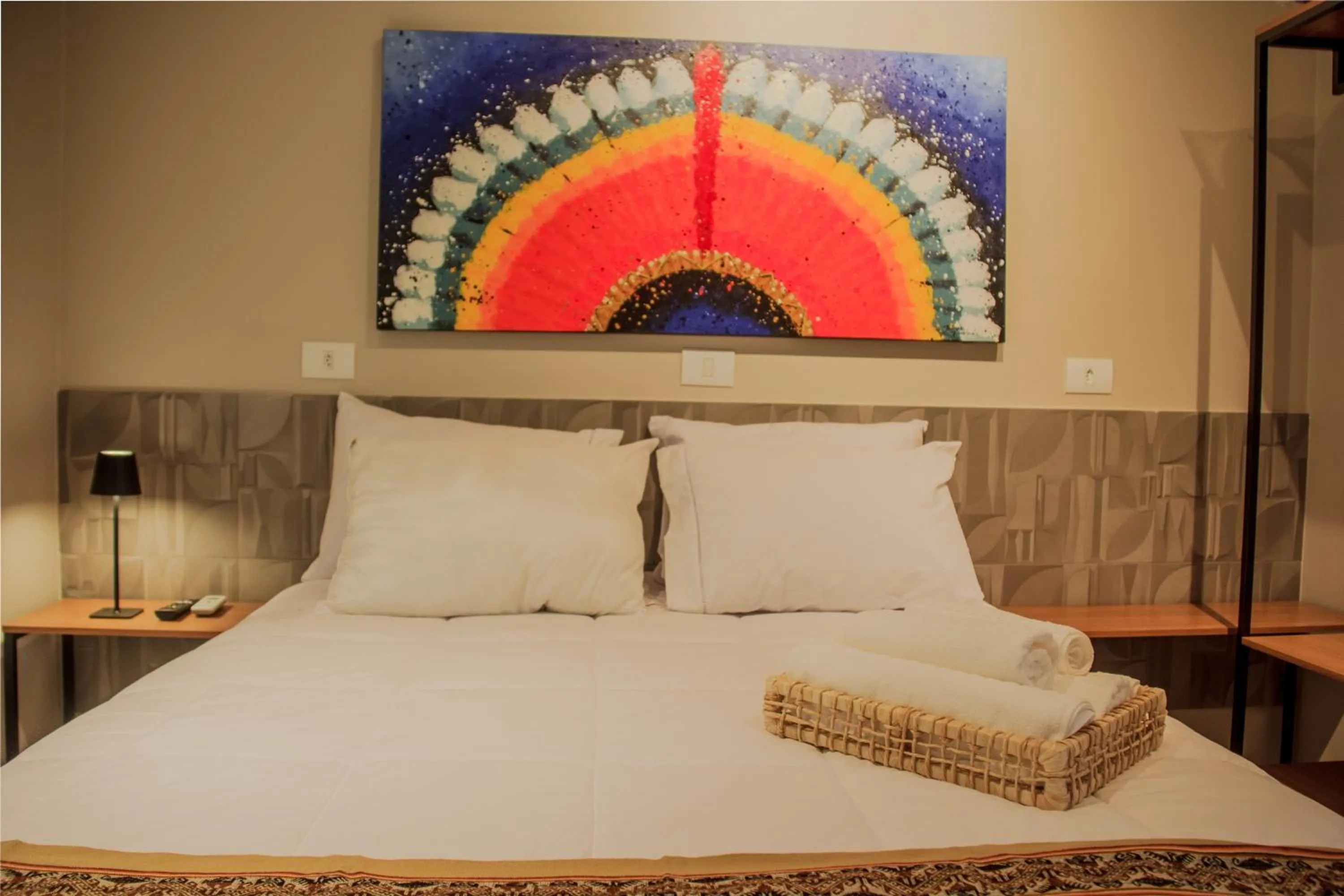 Bed in Che Hermano Suítes