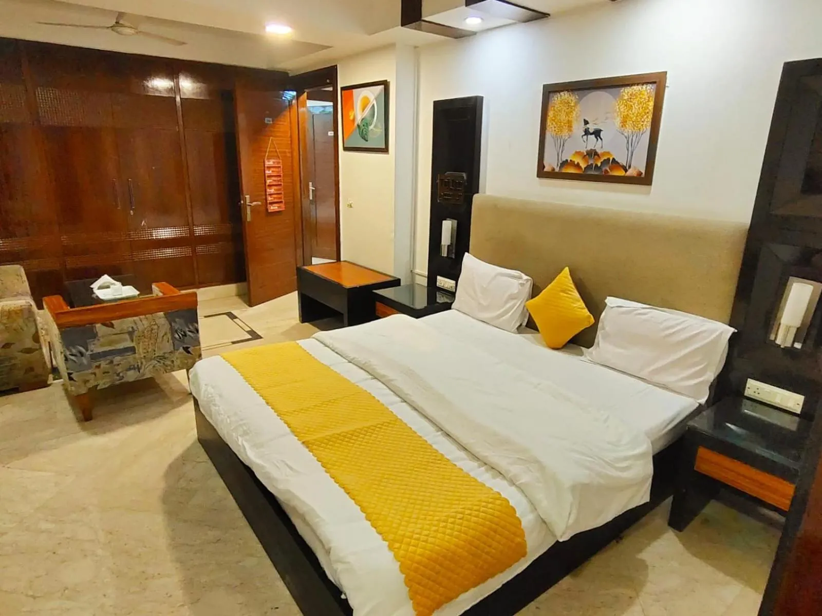 Bed in Taj Inn Residency