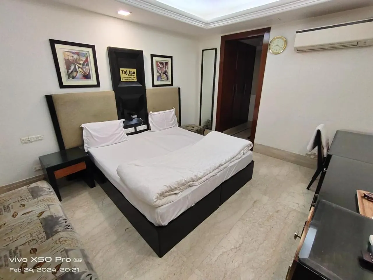 Bed in Taj Inn Residency