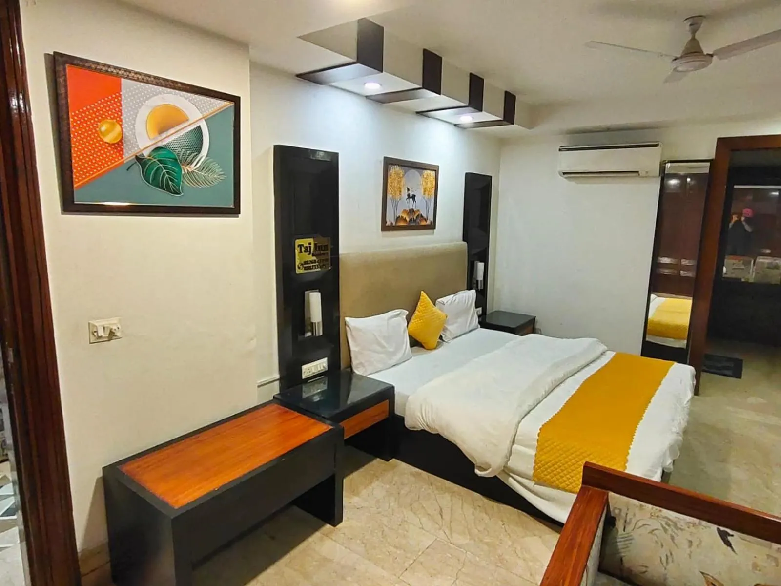 Bed in Taj Inn Residency