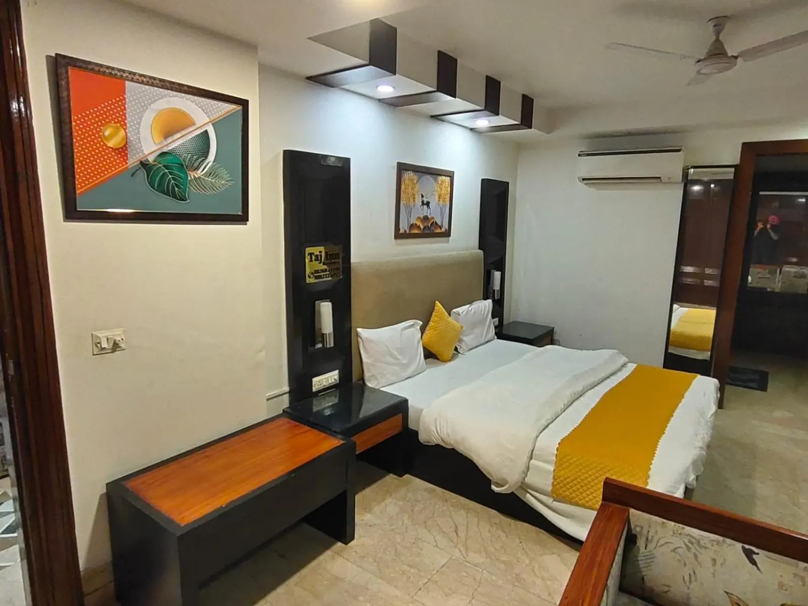 Bed in Taj Inn Residency