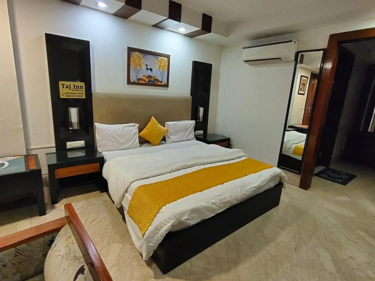 Bed in Taj Inn Residency