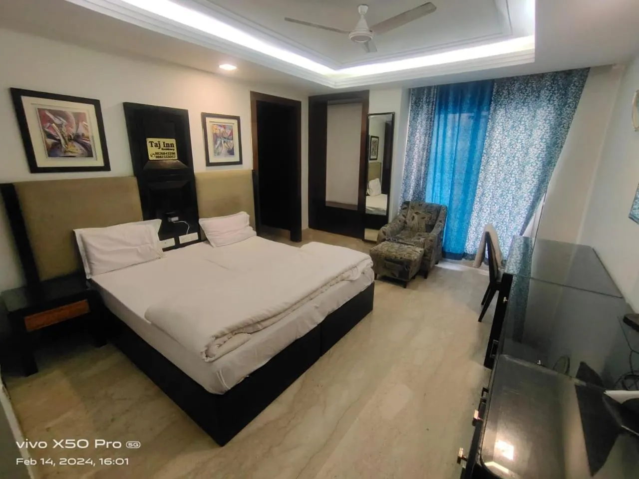 Bed in Taj Inn Residency