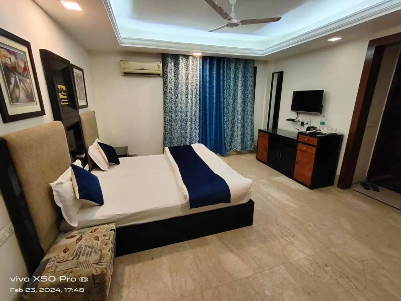 Bed in Taj Inn Residency