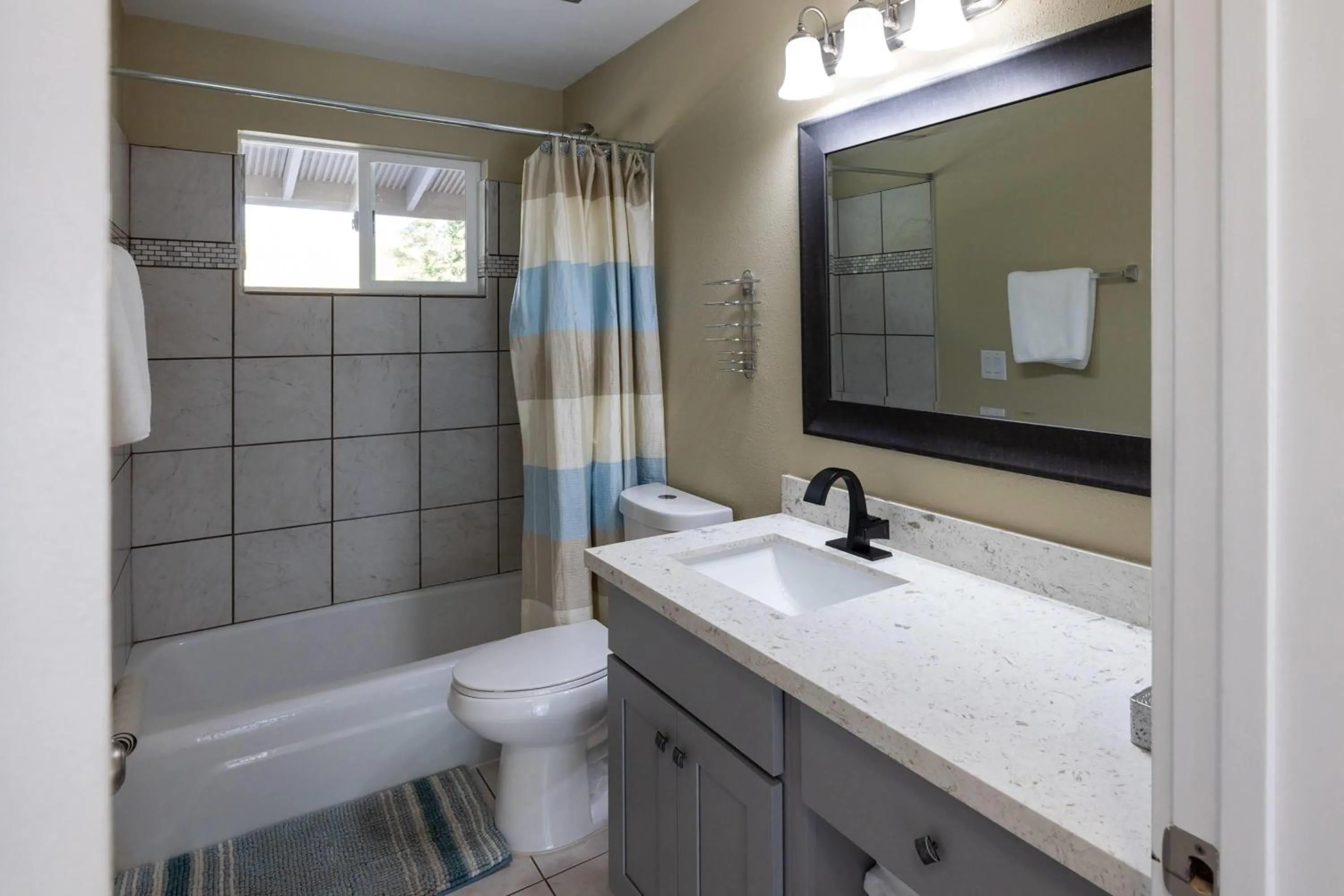 Bathroom in Interurban Suites Hotel, a Dazzler Select by Wyndham