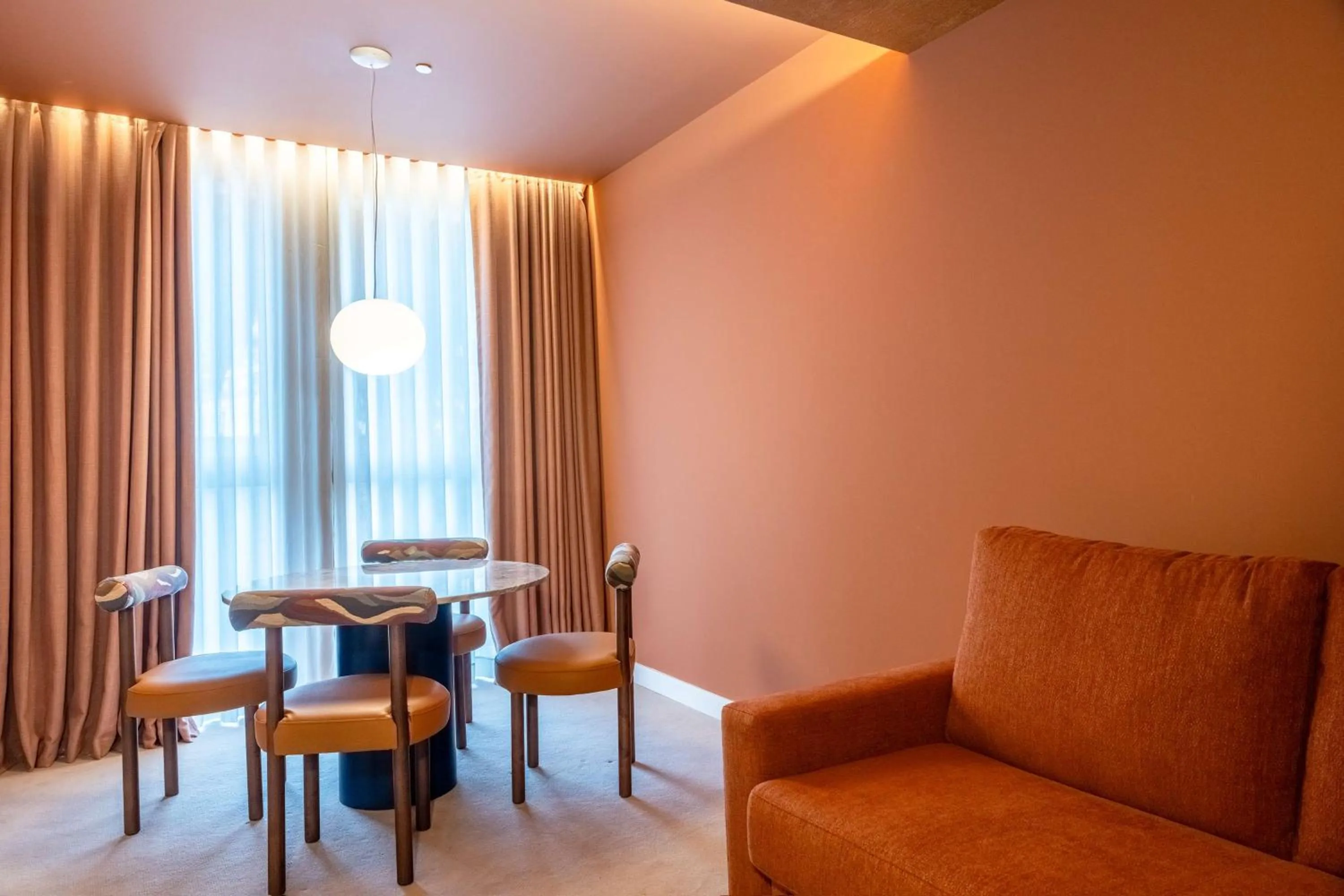 Living room in Cenica Porto Hotel, Curio Collection By Hilton