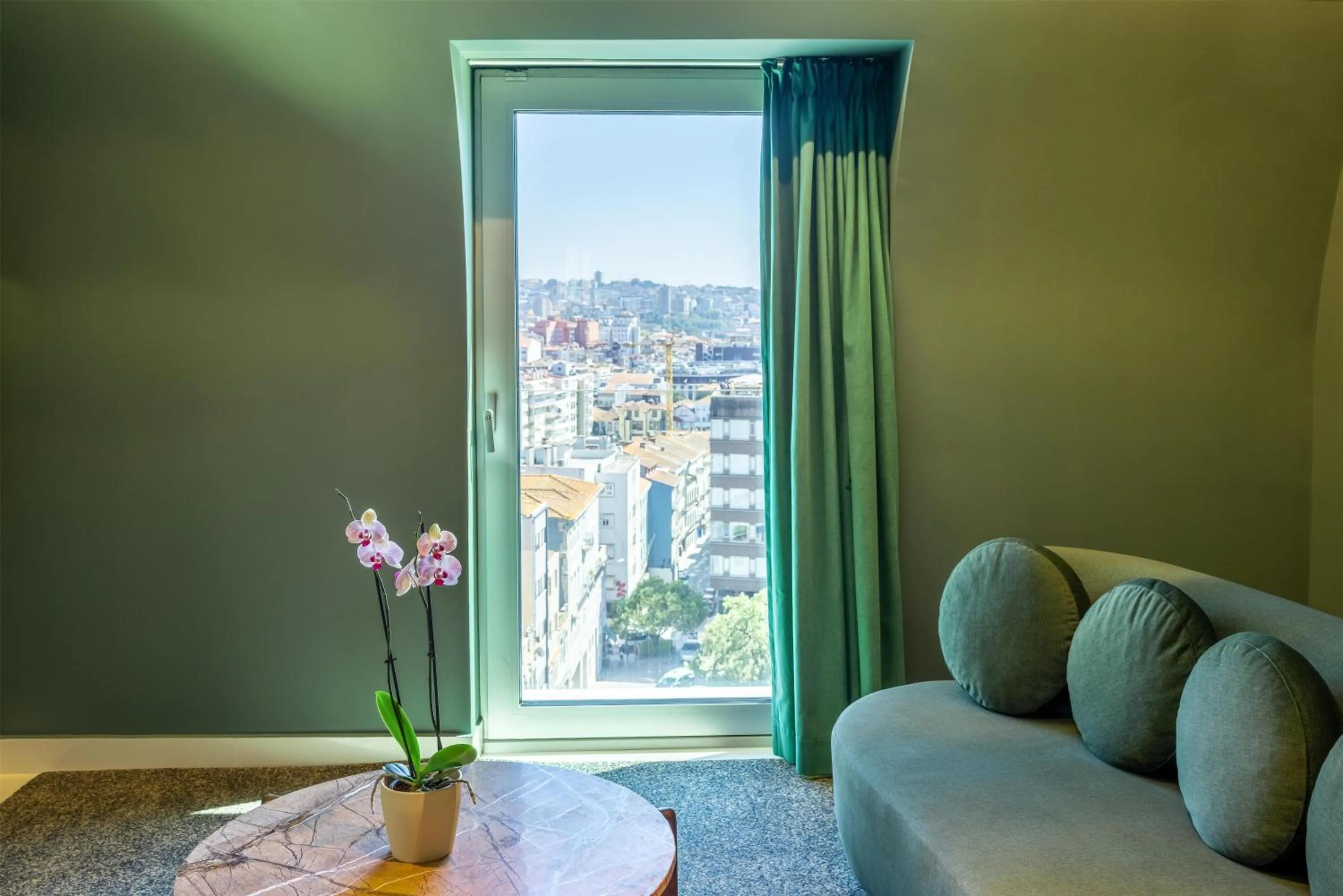 Living room in Cenica Porto Hotel, Curio Collection By Hilton