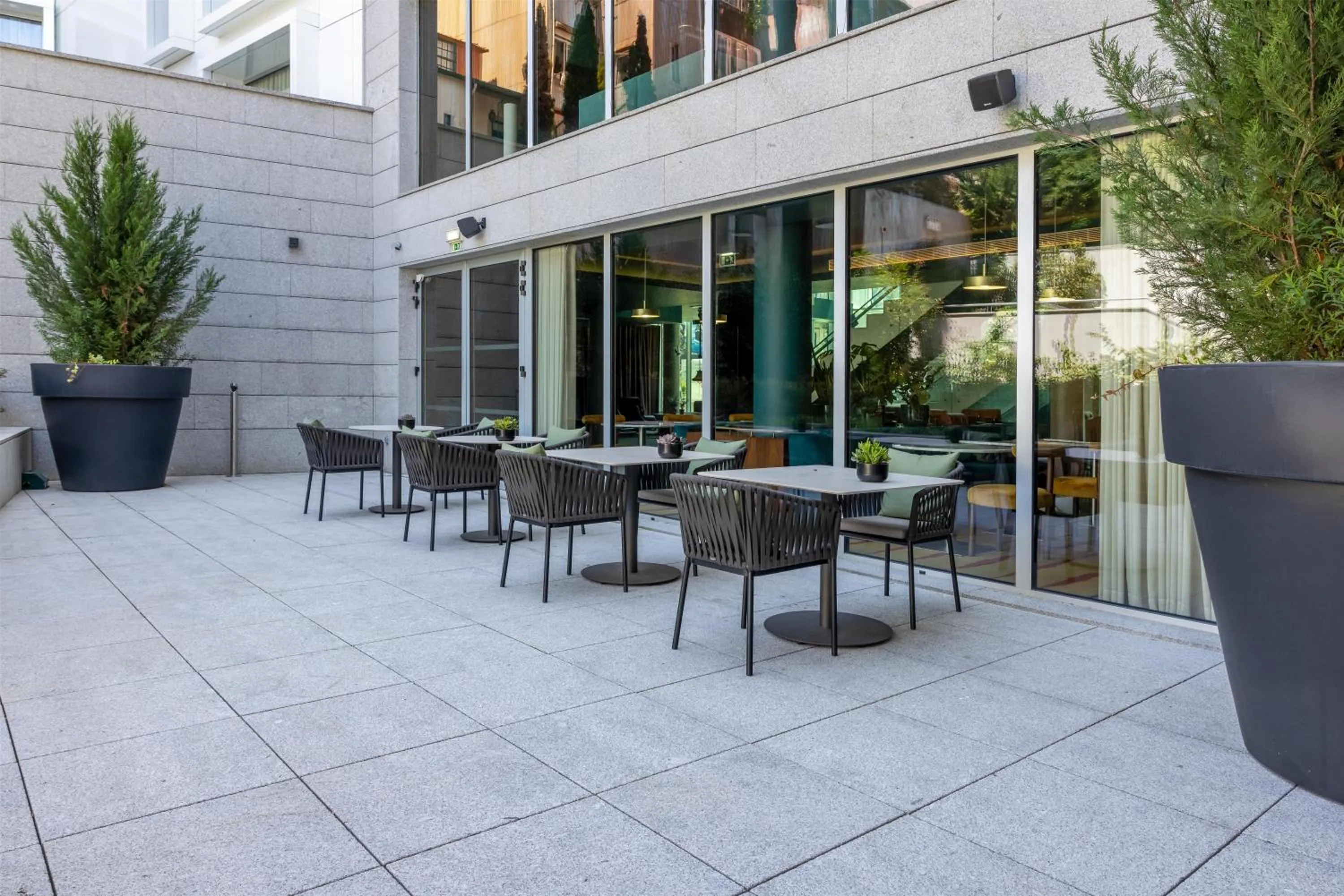 Patio in Cenica Porto Hotel, Curio Collection By Hilton