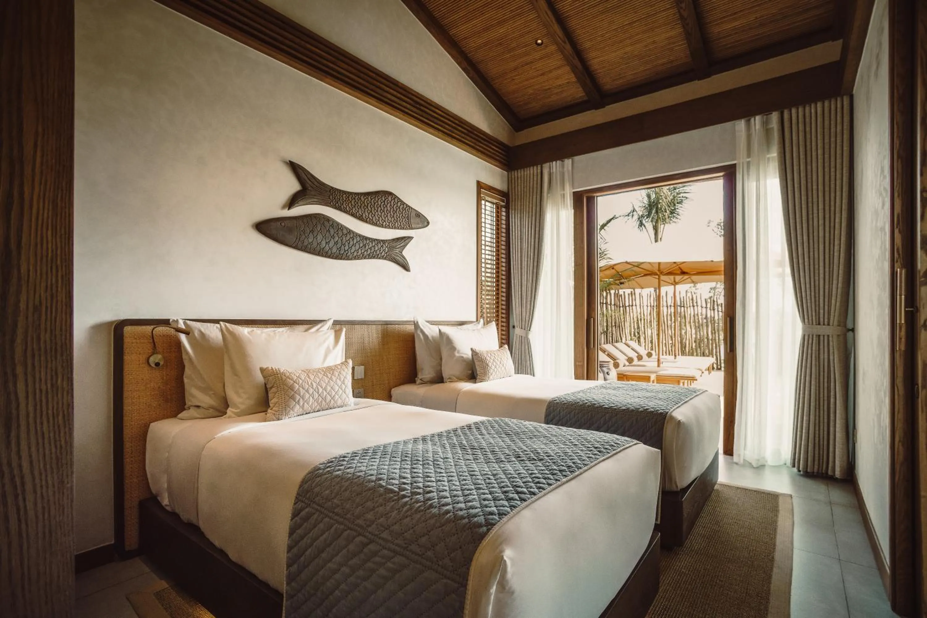 Bed in Namia River Retreat - Wellness Inclusive Resort