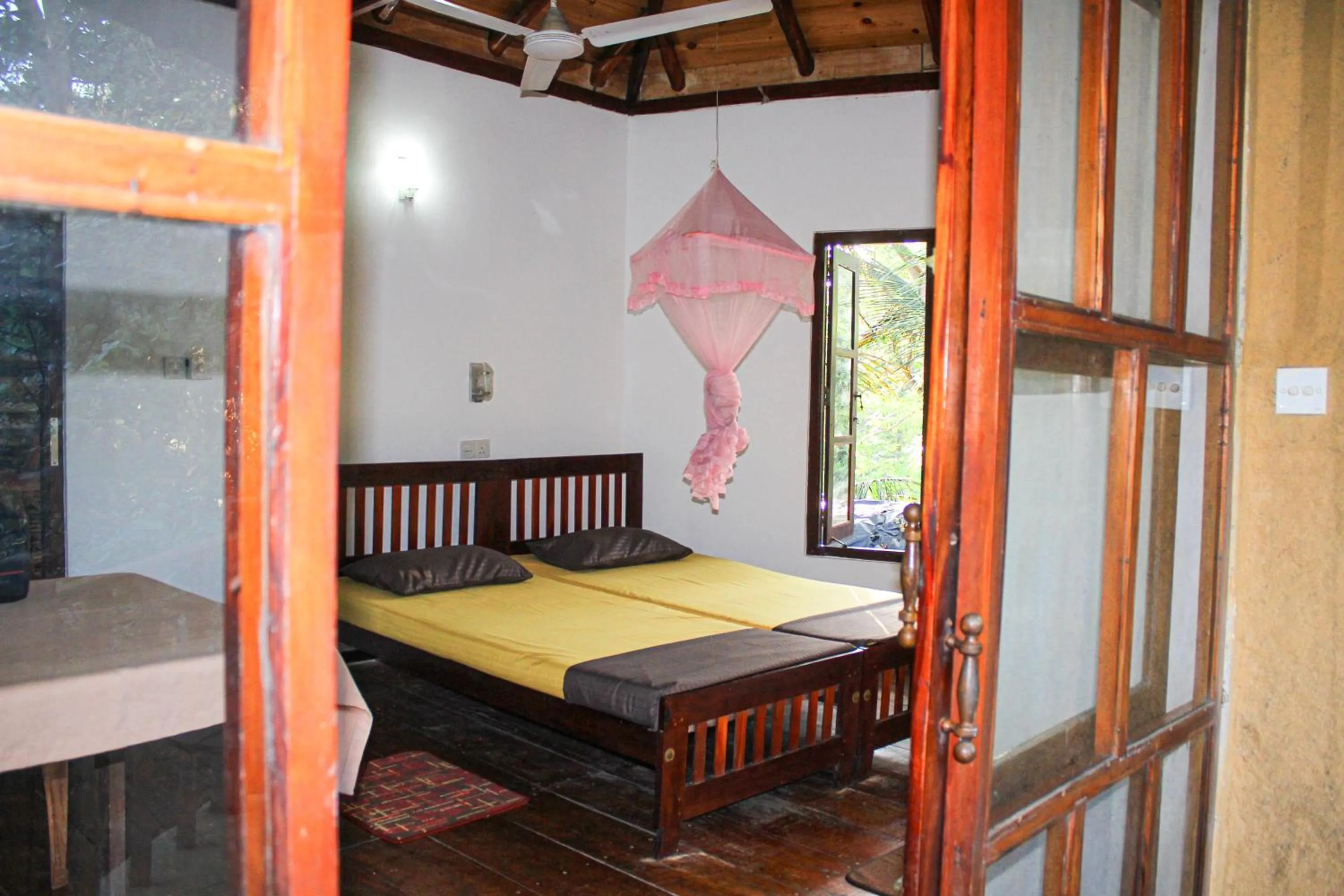 Bed in Seasons Four Mini Jungle Cabana