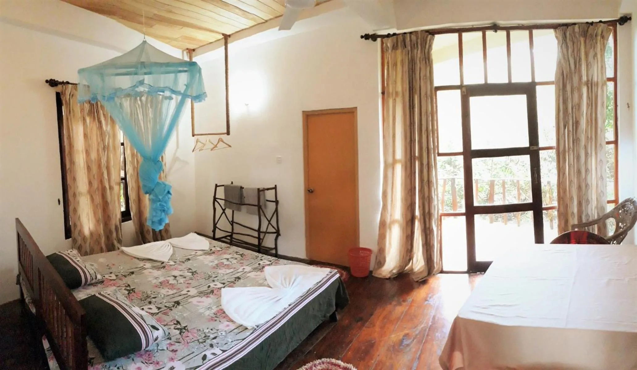 Toilet, Bed in Seasons Four Mini Jungle Cabana