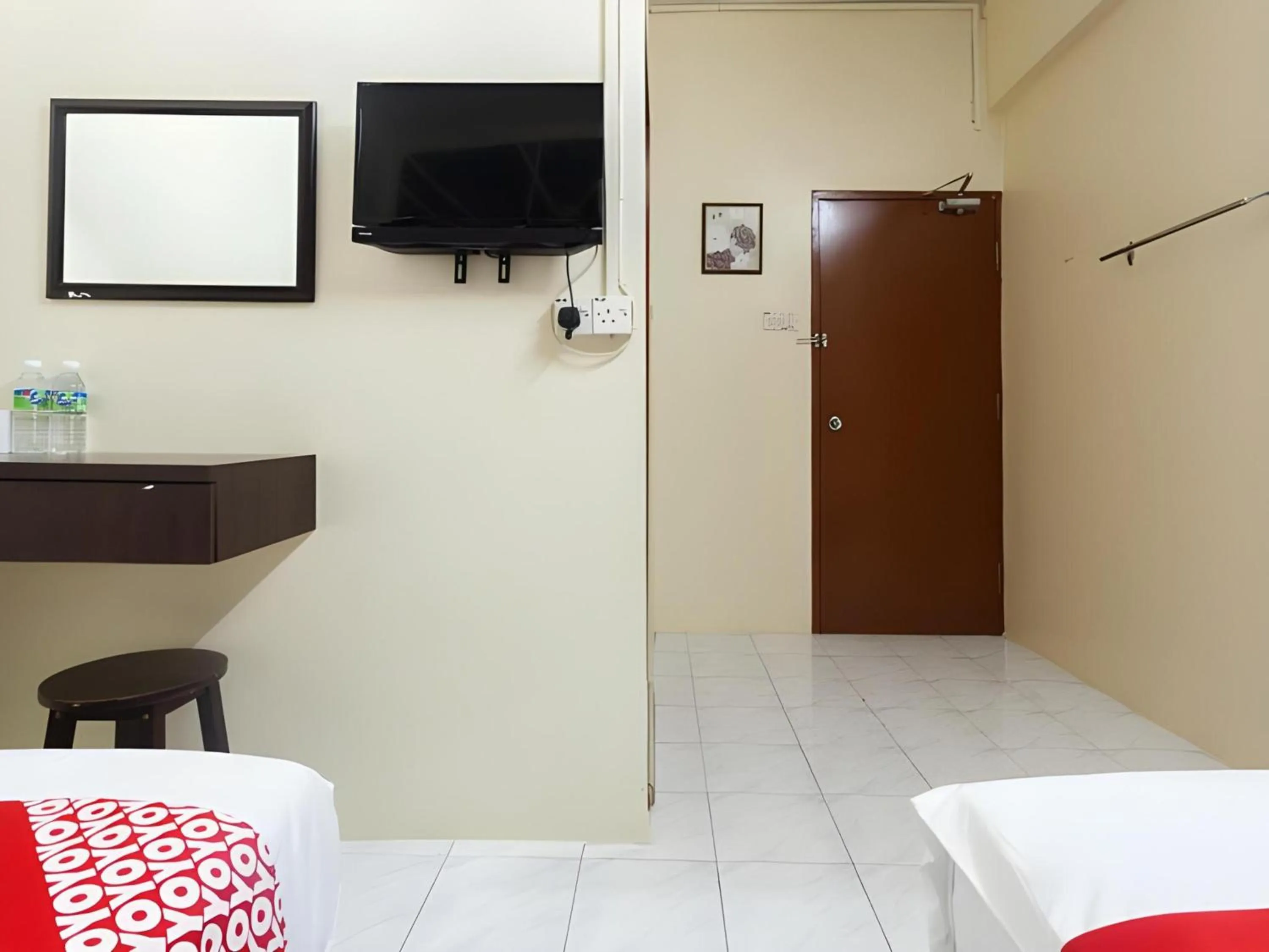 Photo of the whole room in Hotel O Captain Hotel Cafe & Bistro