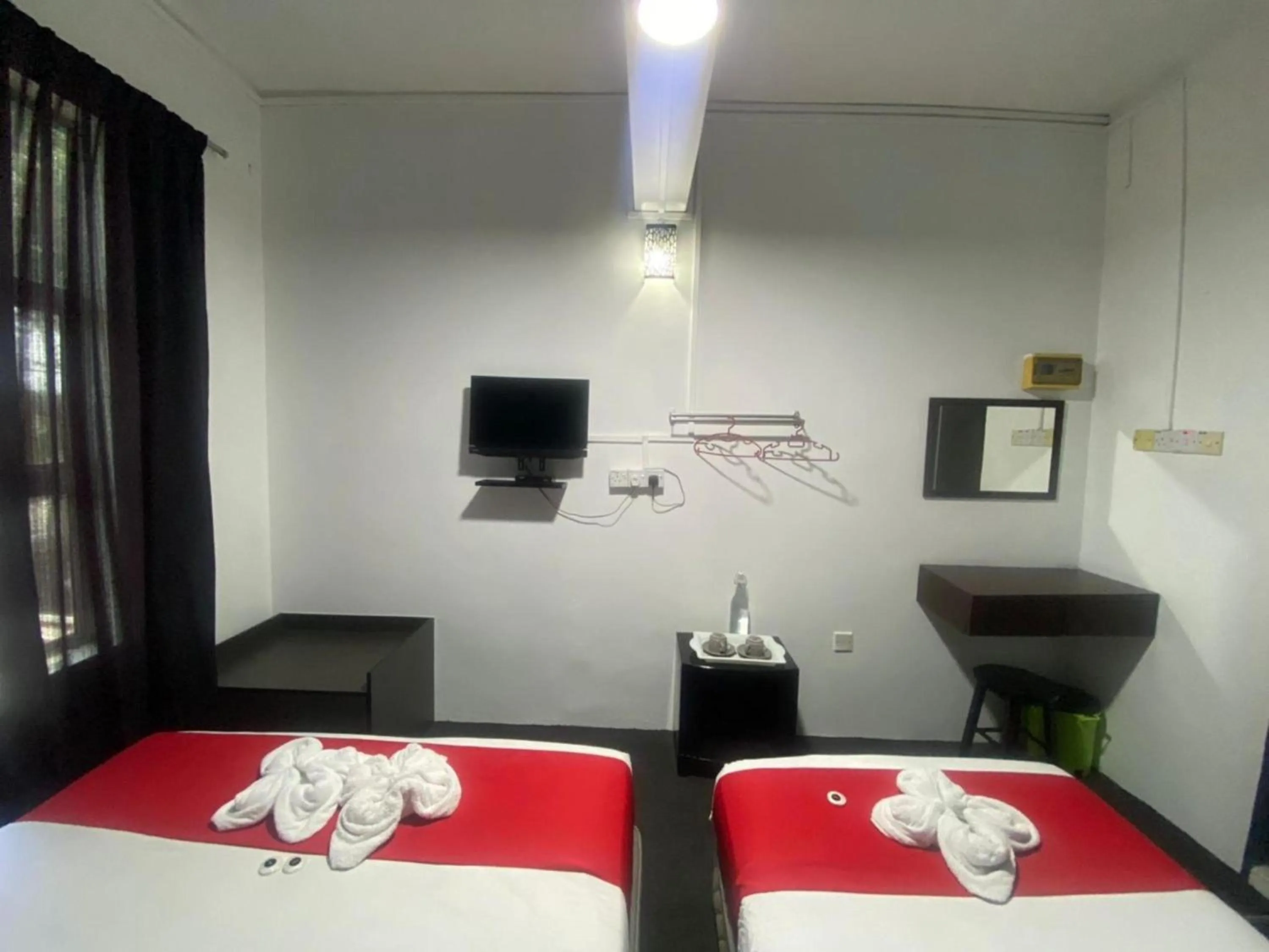 Bedroom in Hotel O Captain Hotel Cafe & Bistro