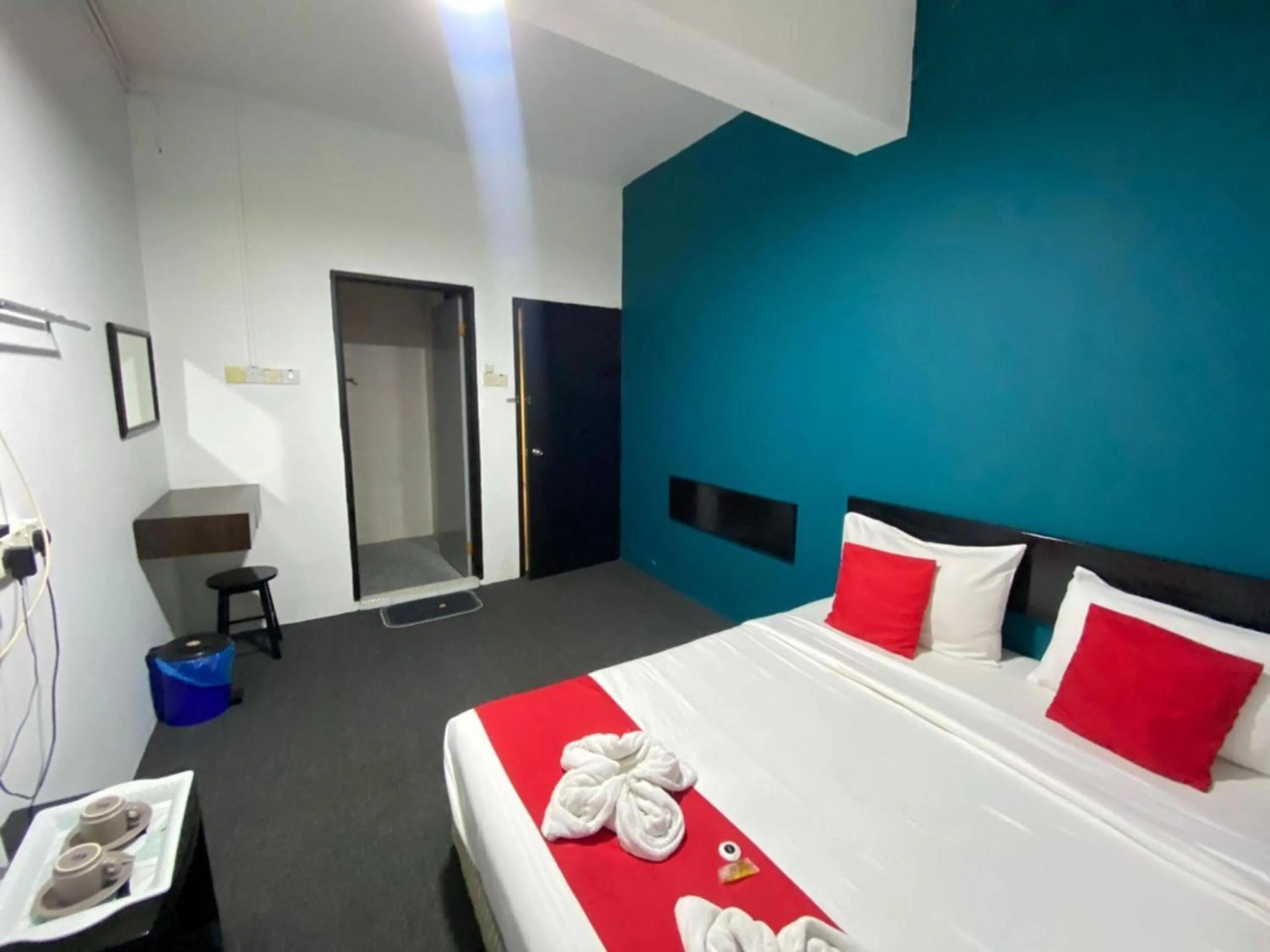 Bedroom in Hotel O Captain Hotel Cafe & Bistro