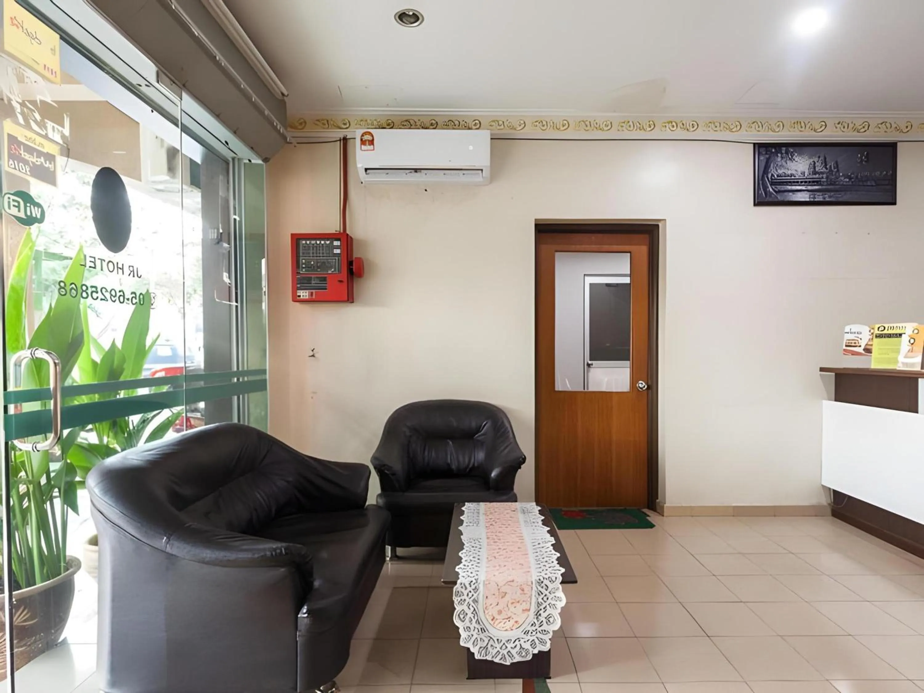 Lobby or reception in Hotel O Captain Hotel Cafe & Bistro