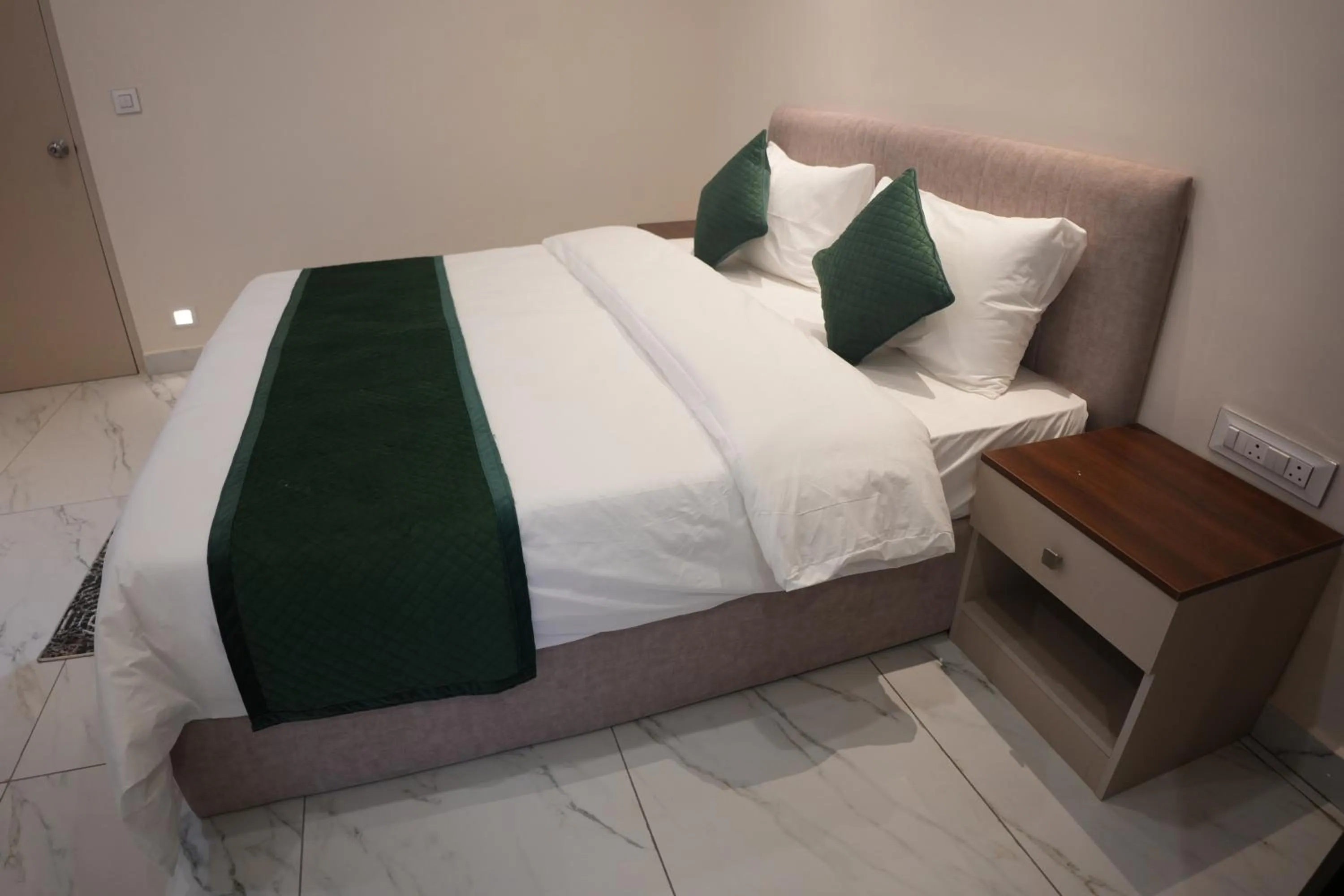 Bed in AK Castle Suites