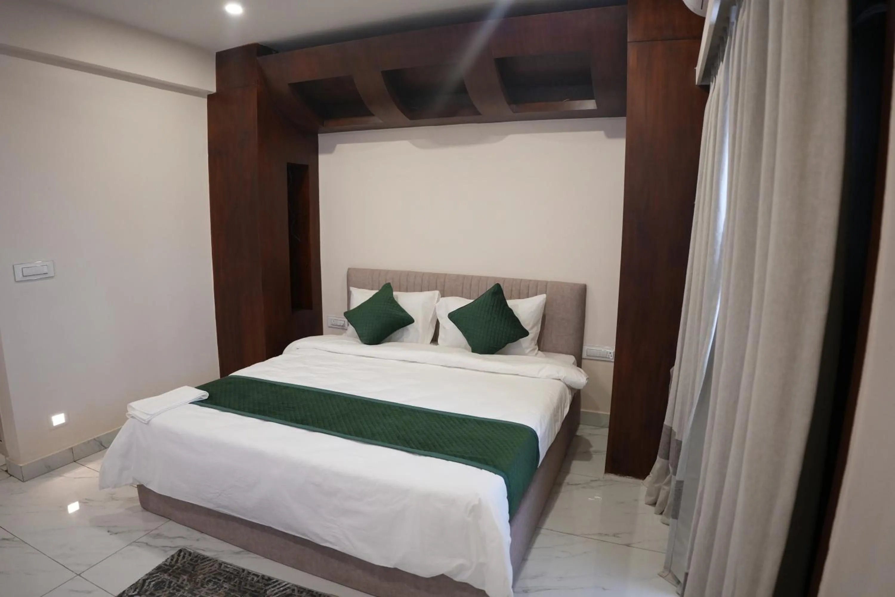 Bed in AK Castle Suites