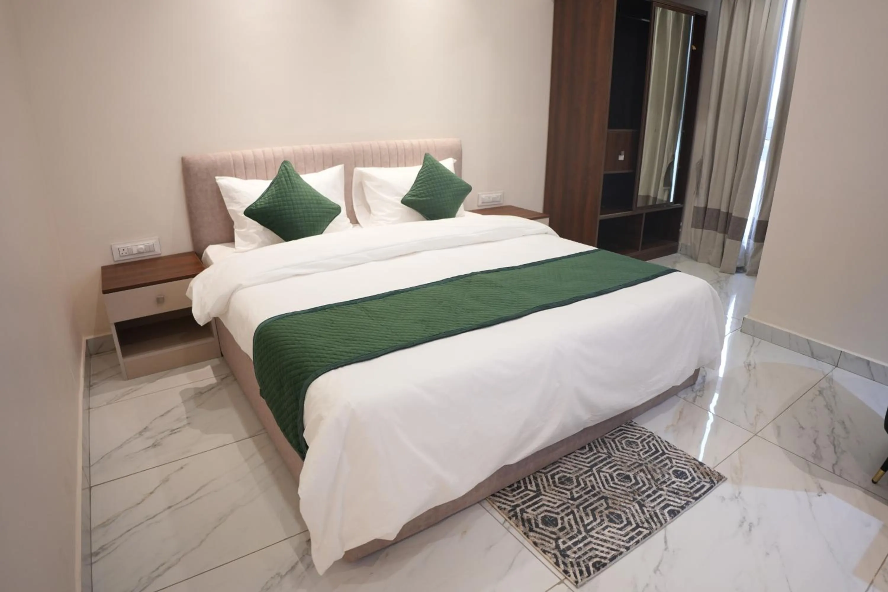 Bed in AK Castle Suites