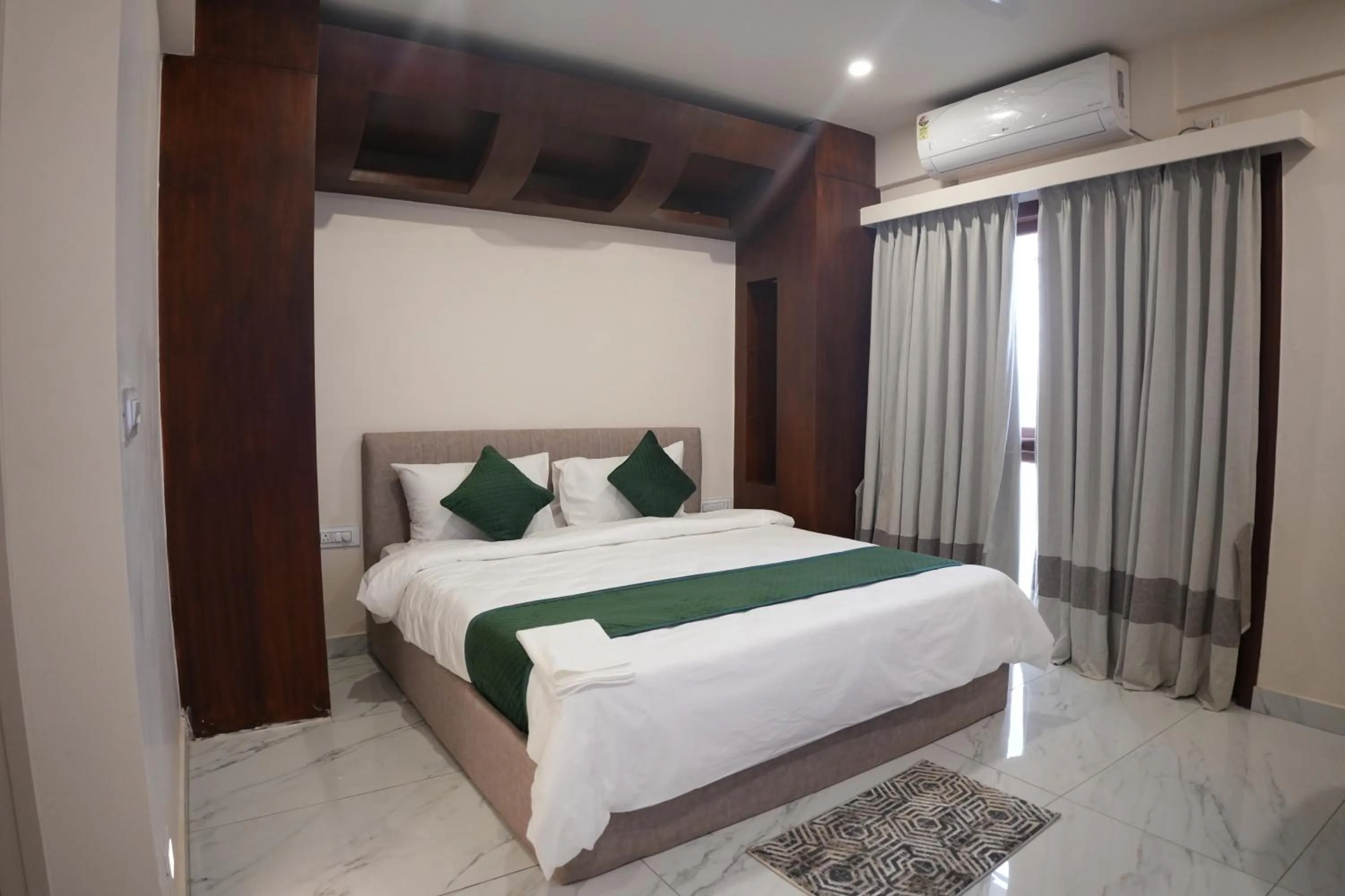 Bed in AK Castle Suites