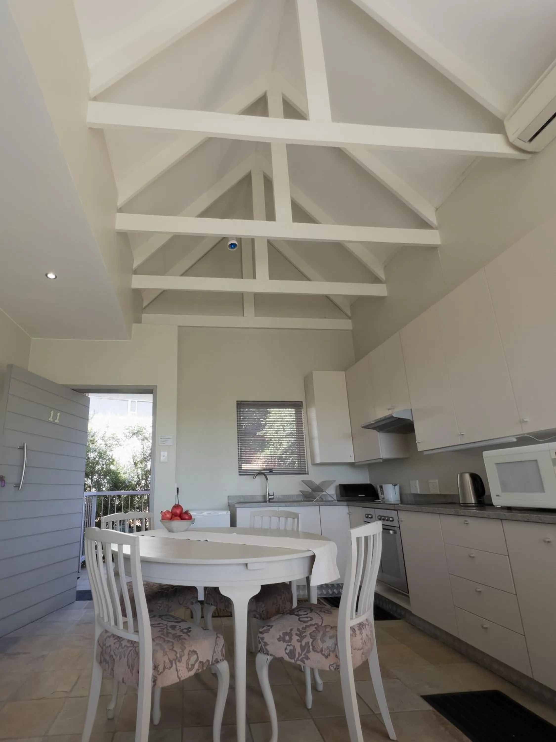 Kitchen or kitchenette in Orangerie Guest House