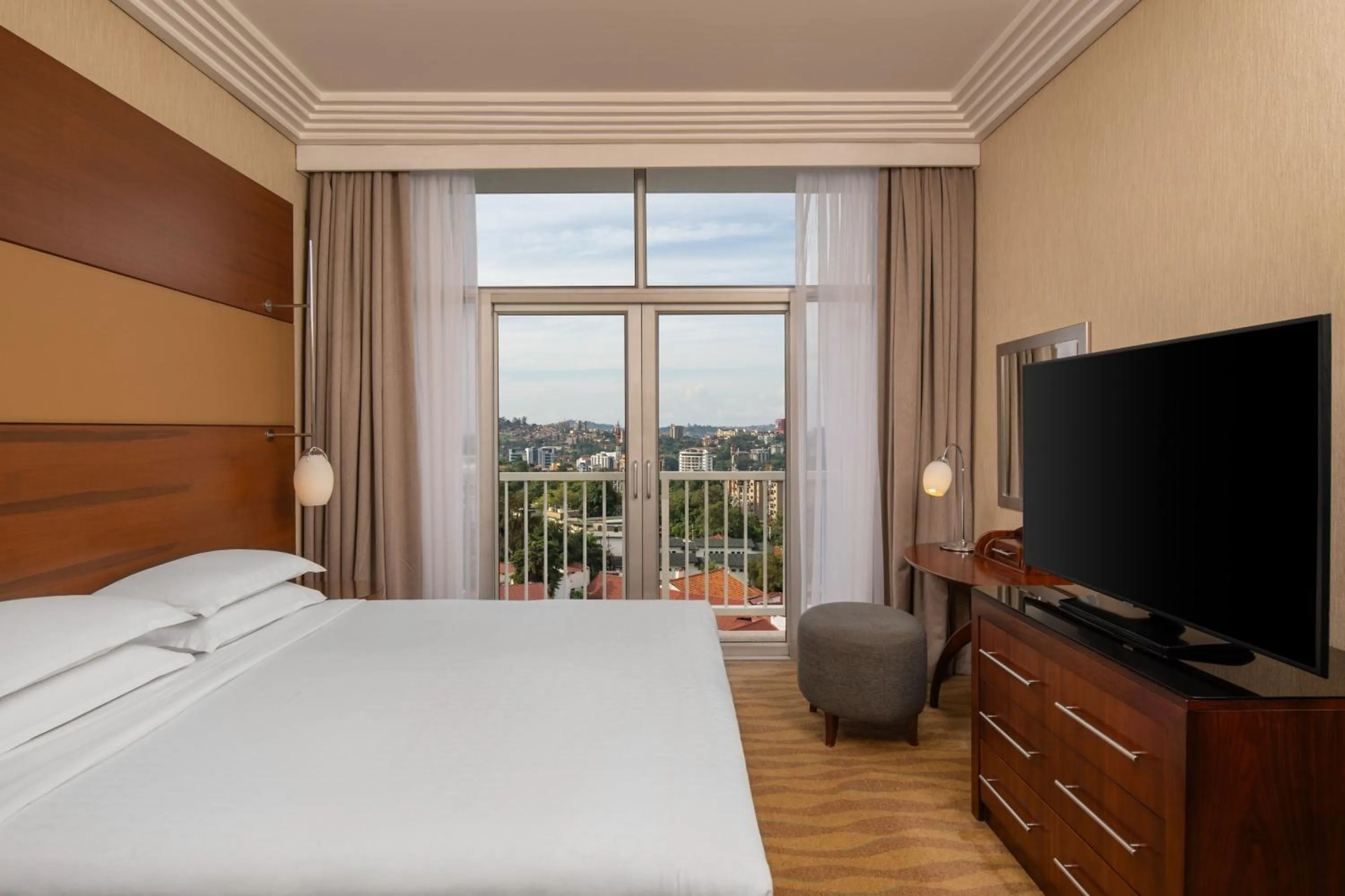 Photo of the whole room, Bed in Sheraton Kampala Hotel