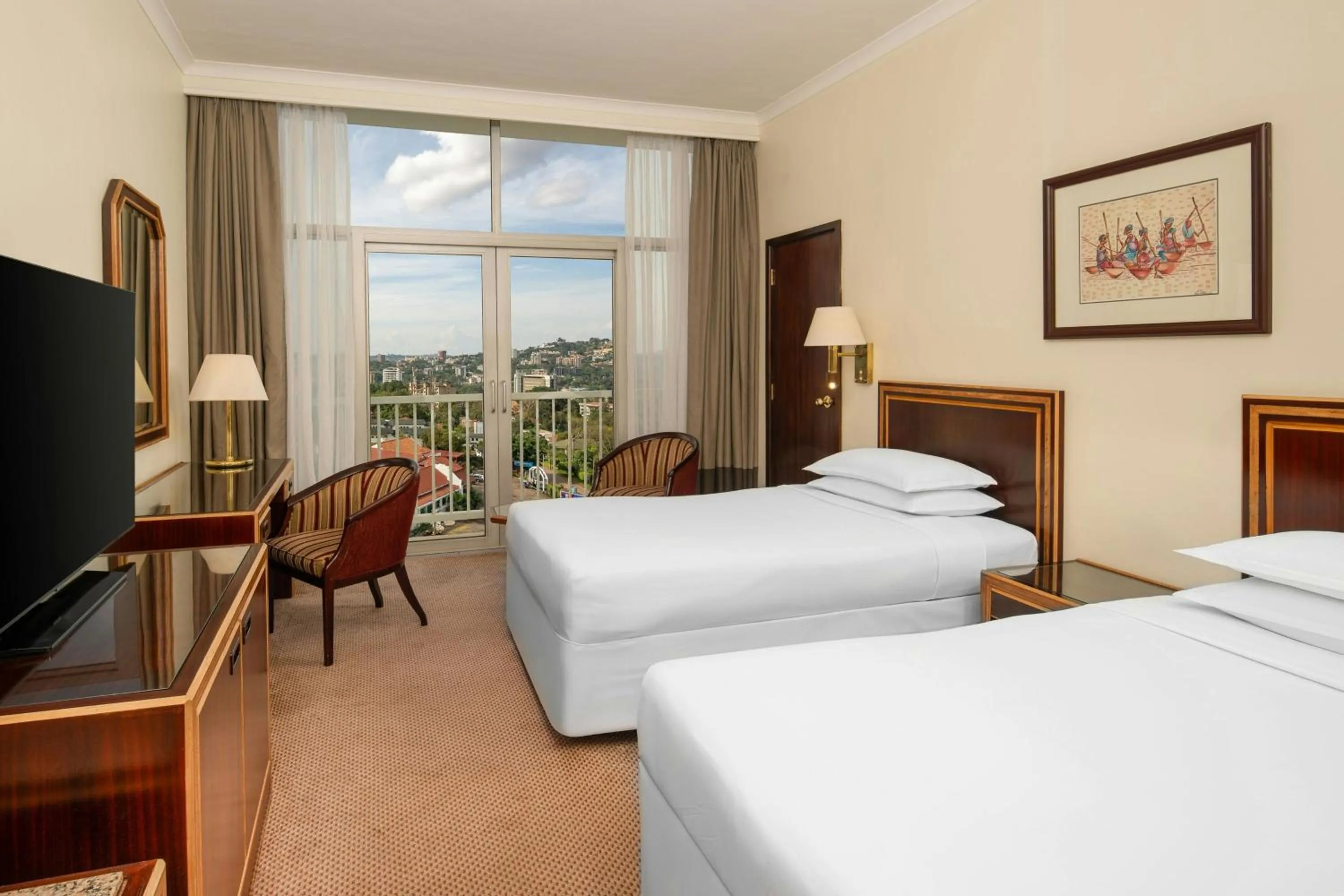 Photo of the whole room, Bed in Sheraton Kampala Hotel