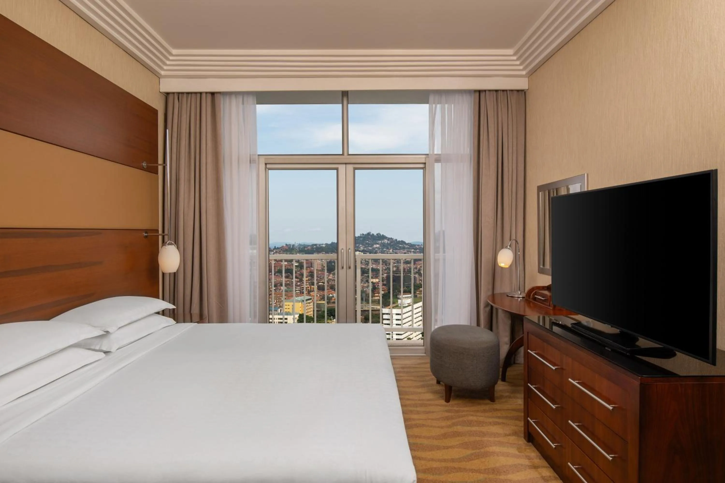 Photo of the whole room, Bed in Sheraton Kampala Hotel