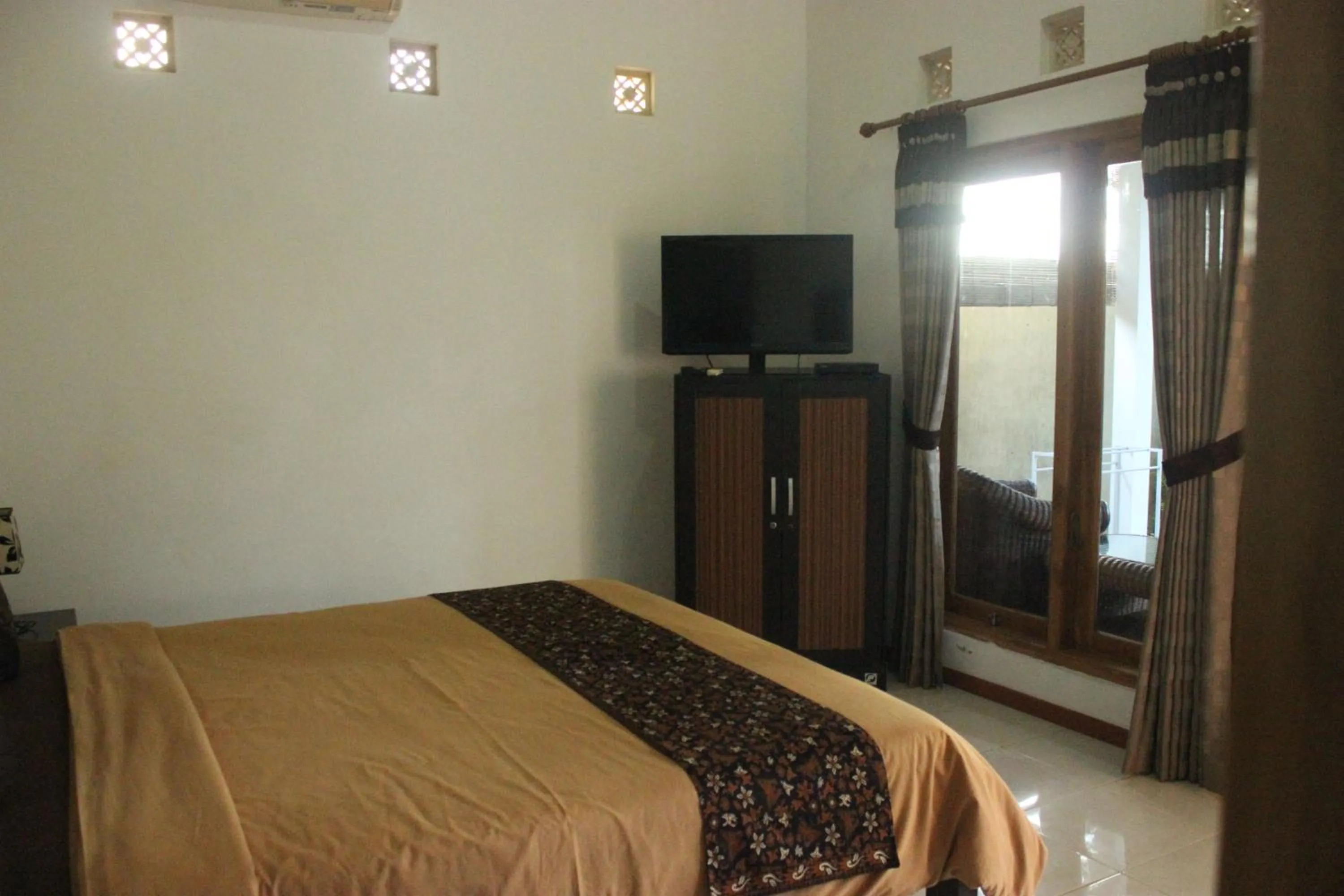 Bed in Kartika Villas