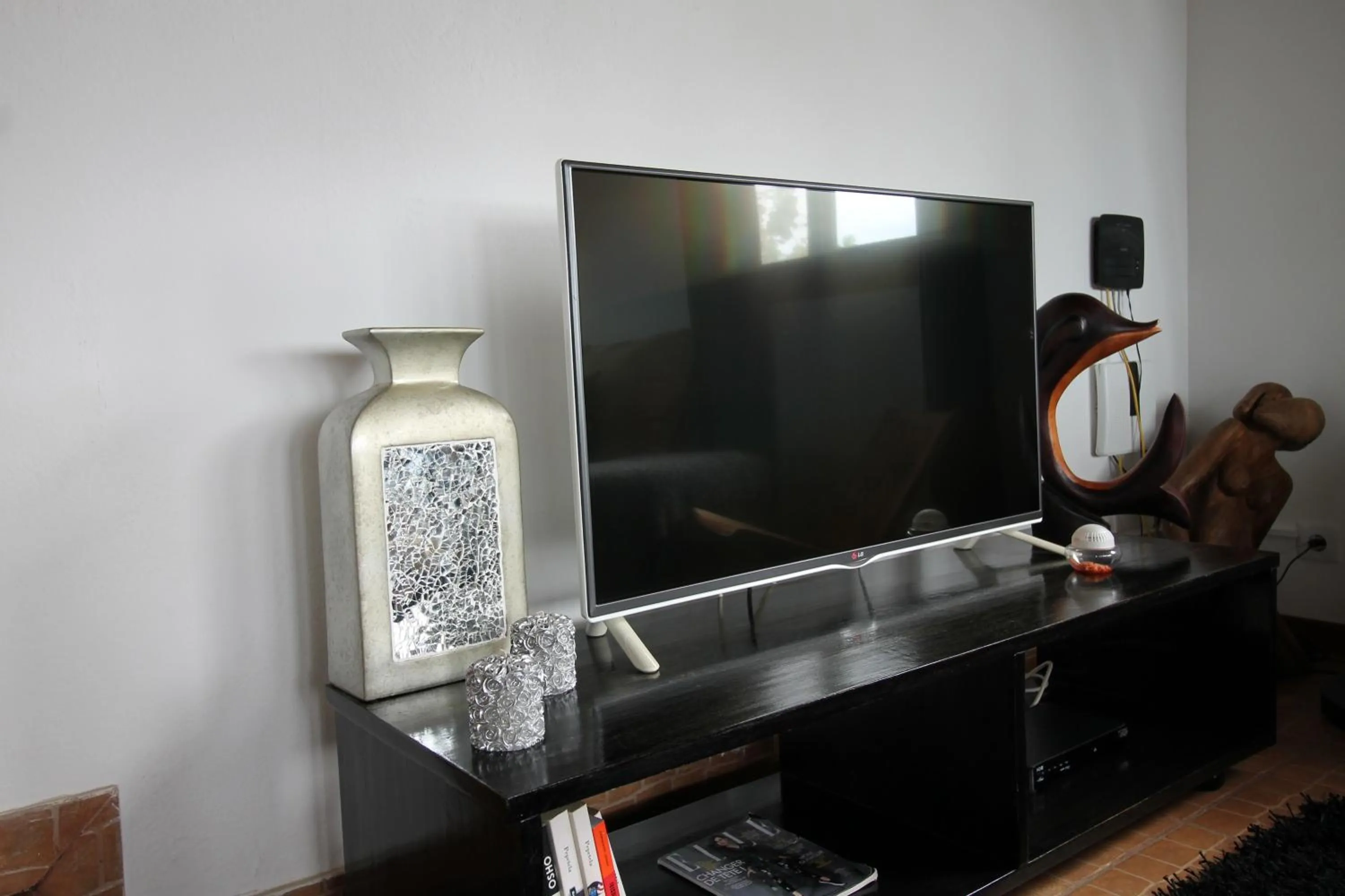 Communal lounge/ TV room in Sweet Guest House