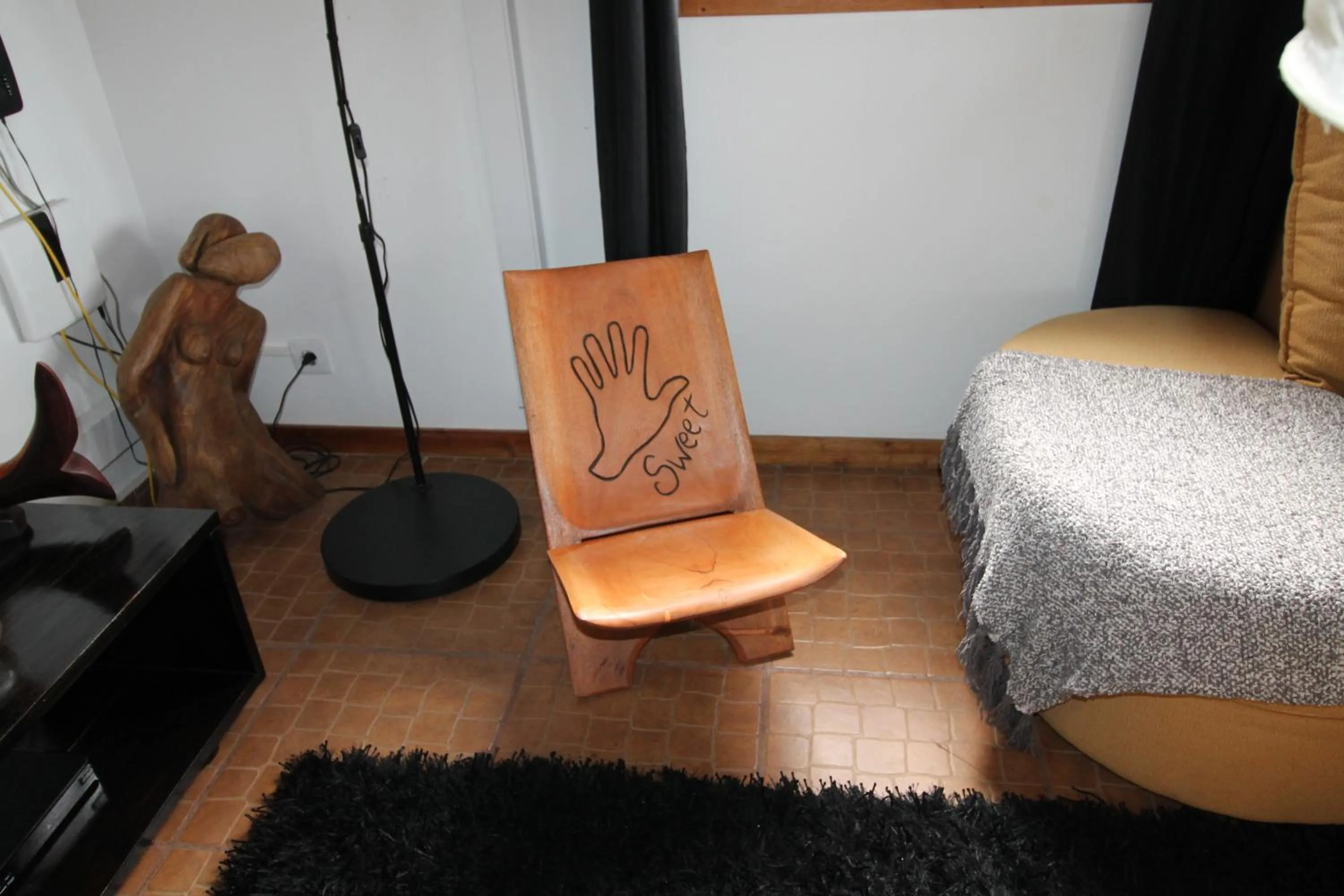 Communal lounge/ TV room in Sweet Guest House