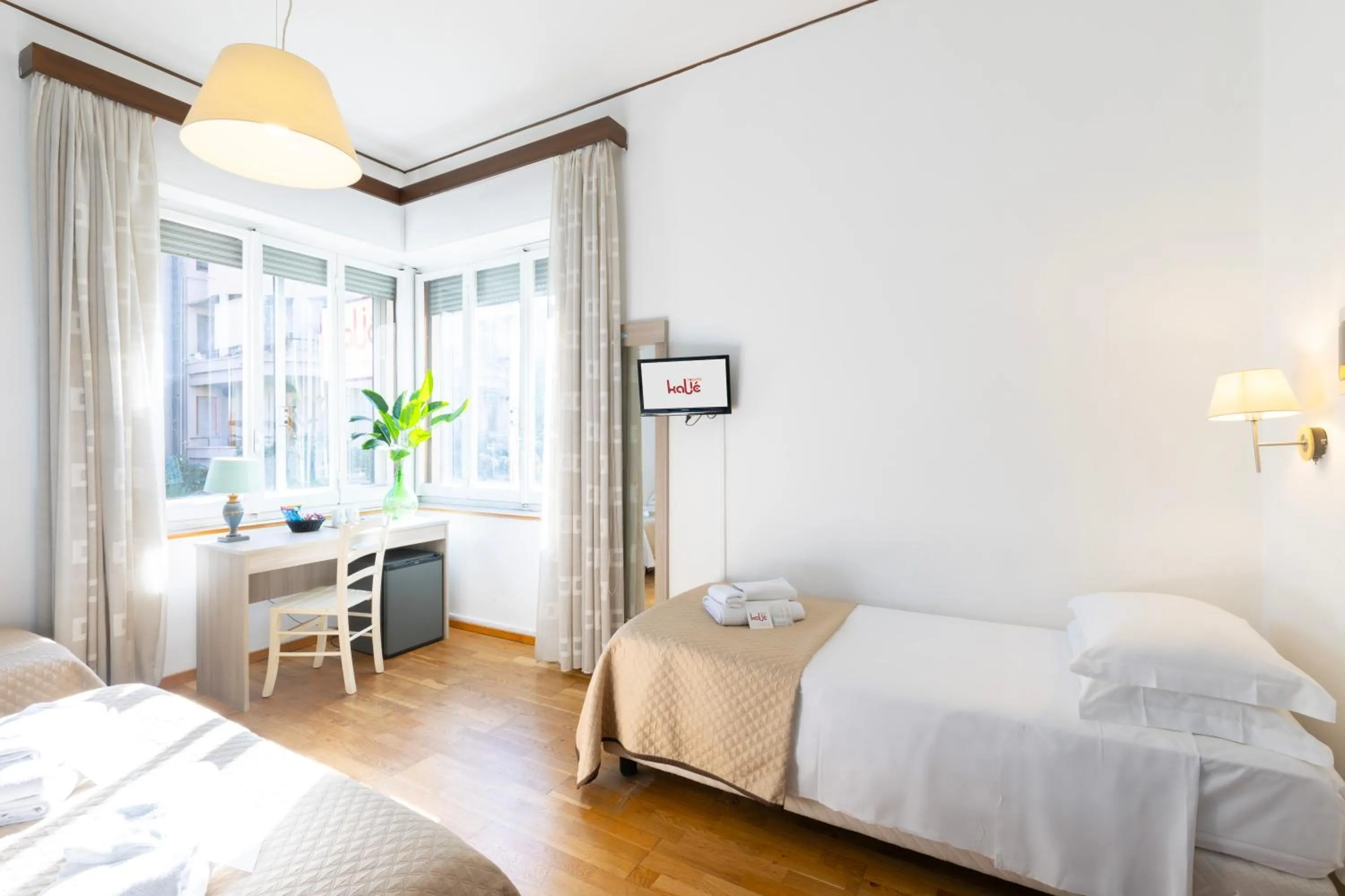 Bed in Kaliè Rooms Guest House