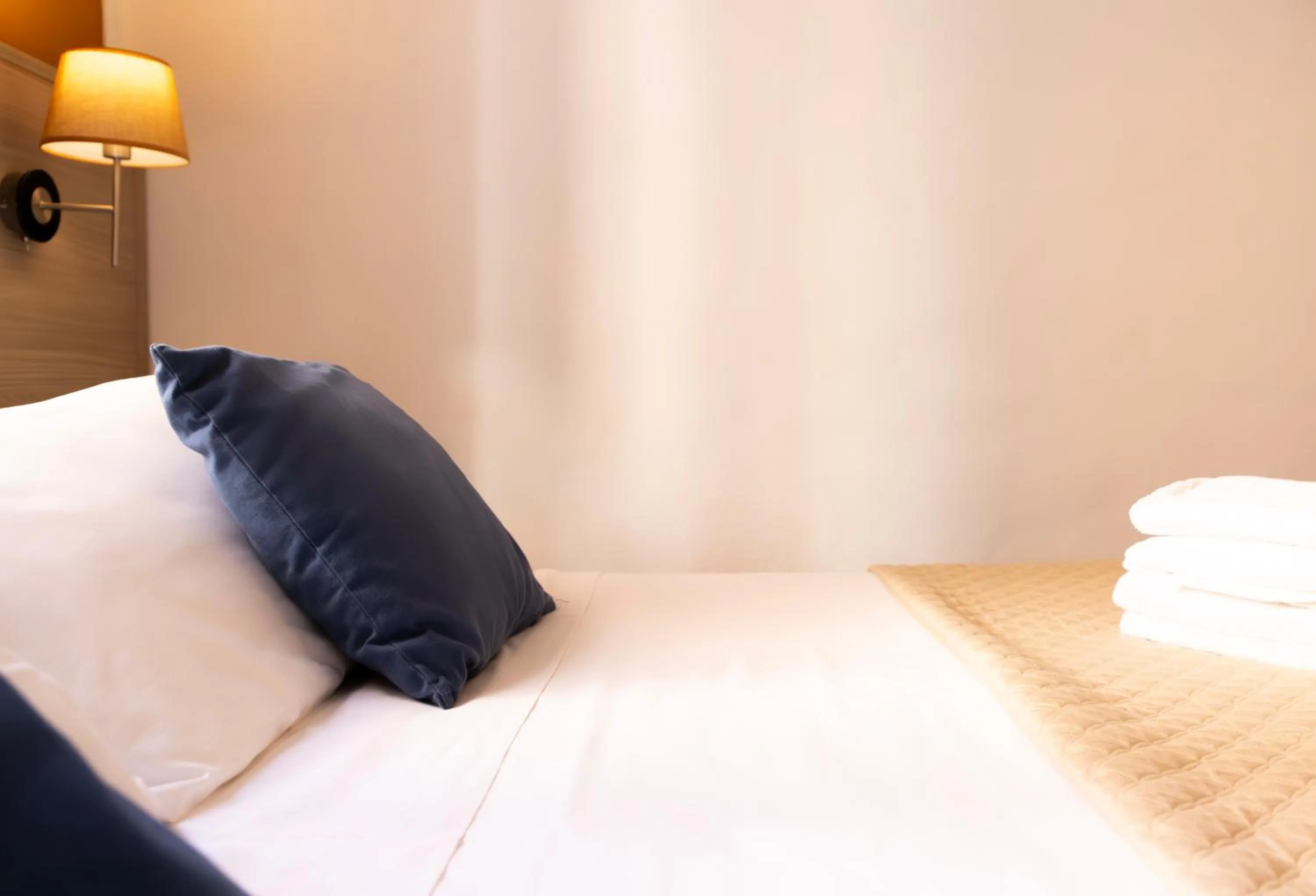 Bed in Kaliè Rooms Guest House