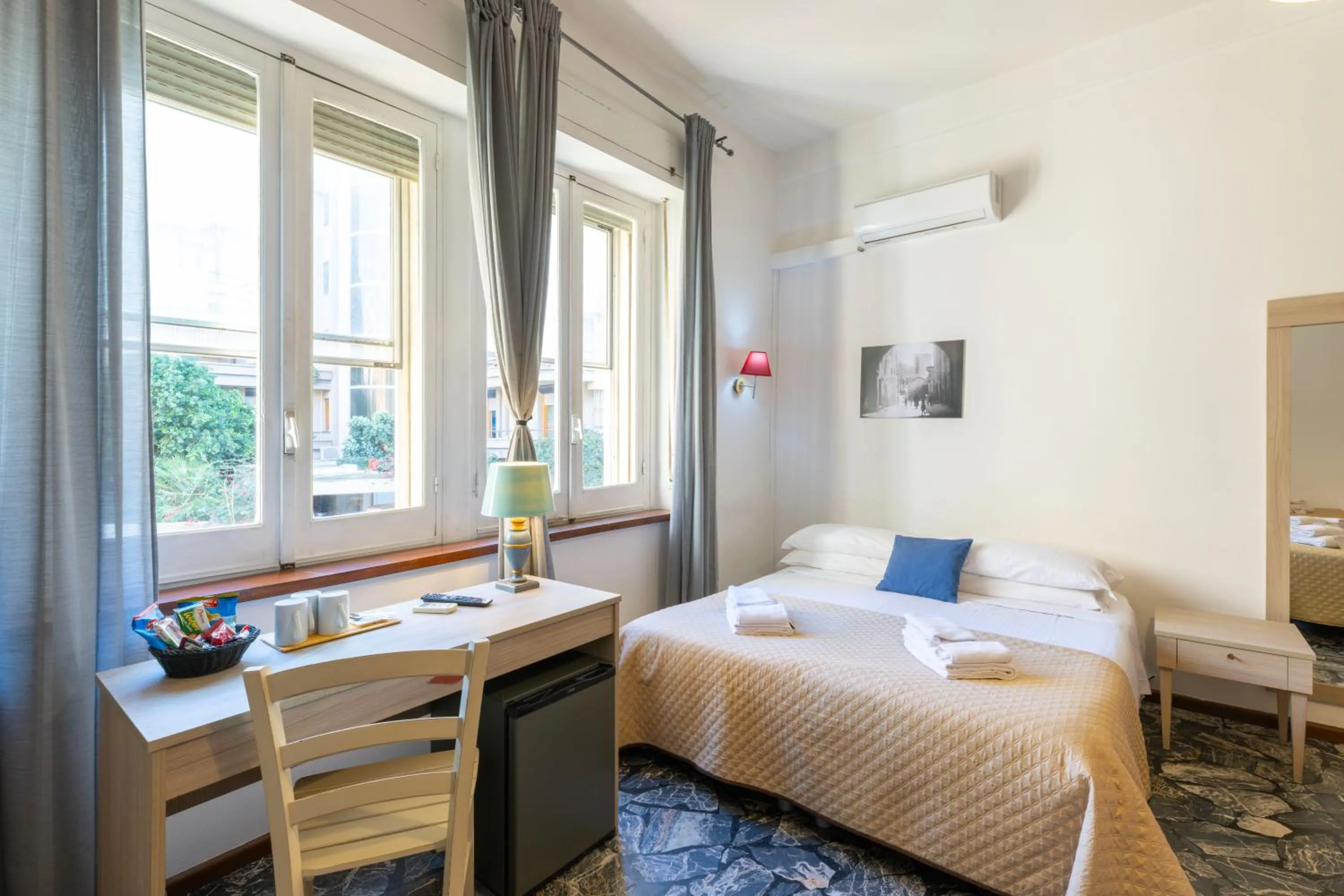 Bed in Kaliè Rooms Guest House