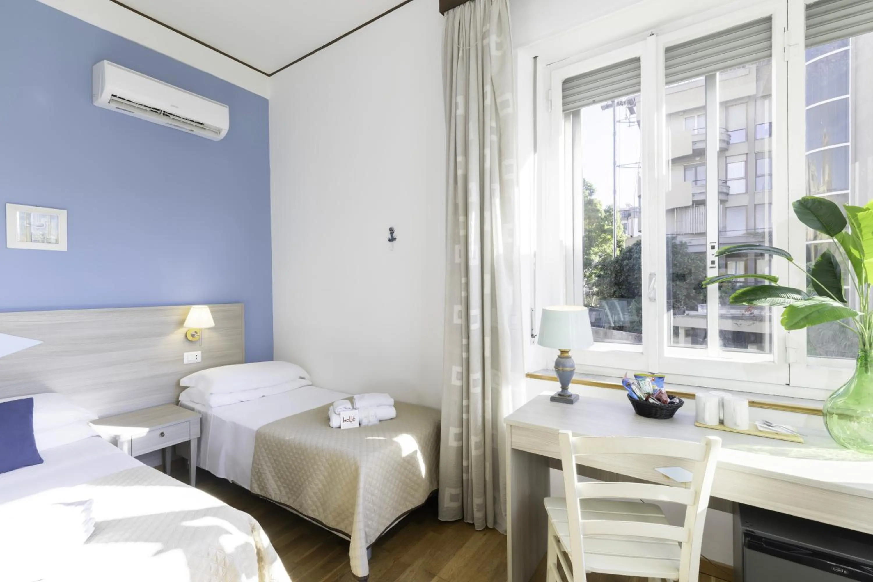 Bed in Kaliè Rooms Guest House