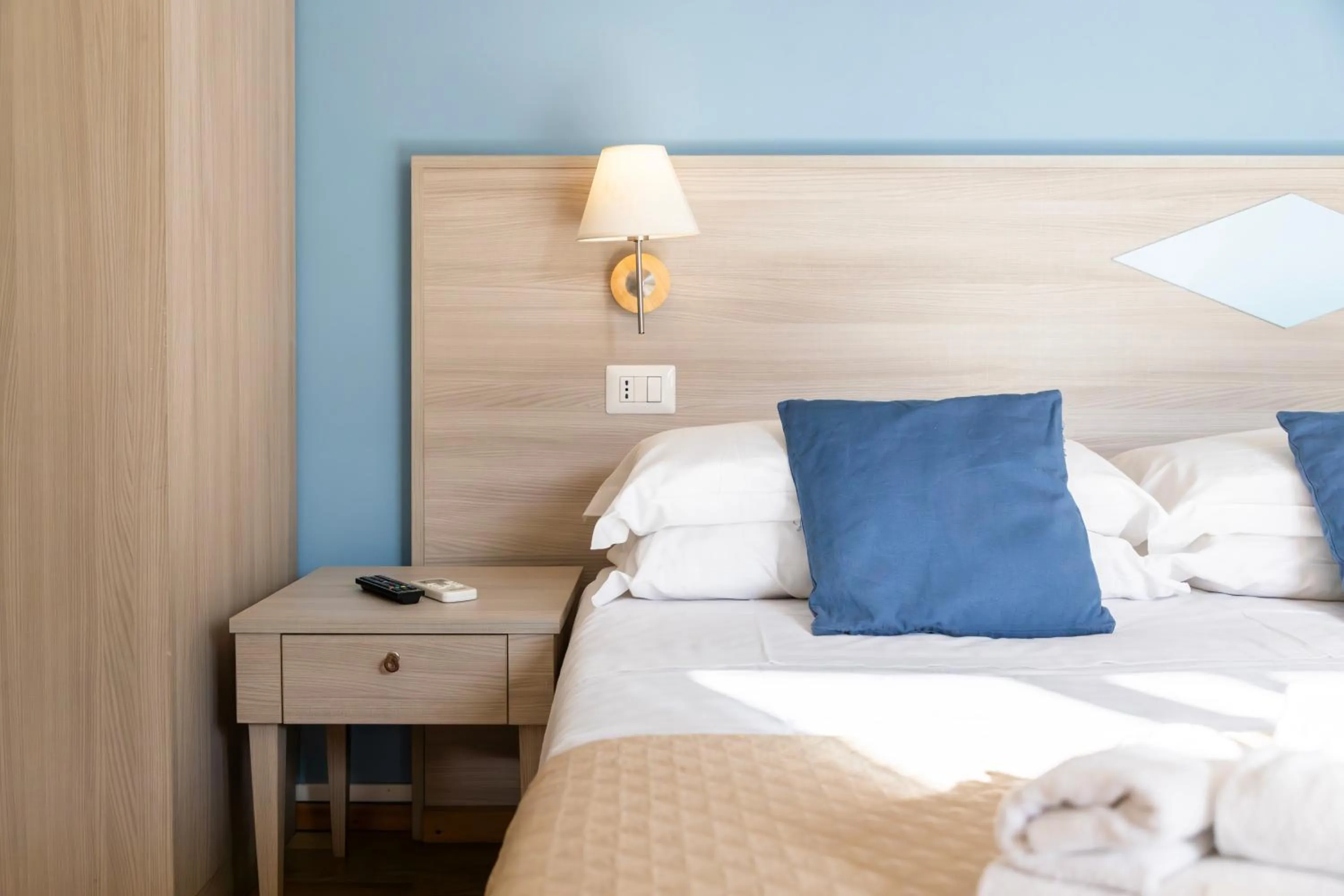 Bed in Kaliè Rooms Guest House