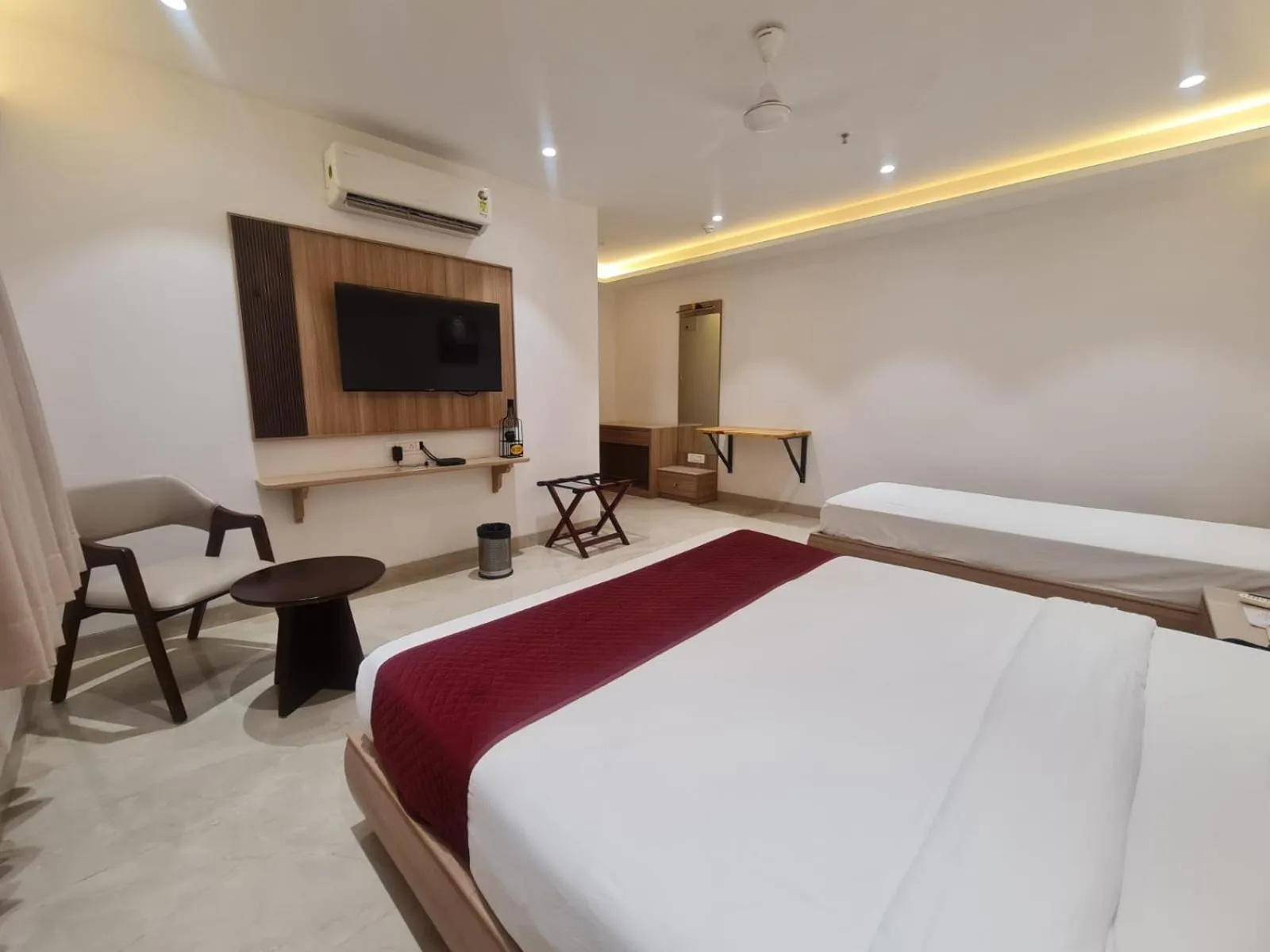 Photo of the whole room, Bed in The Grand Murli Hotel, City Light Road, Surat