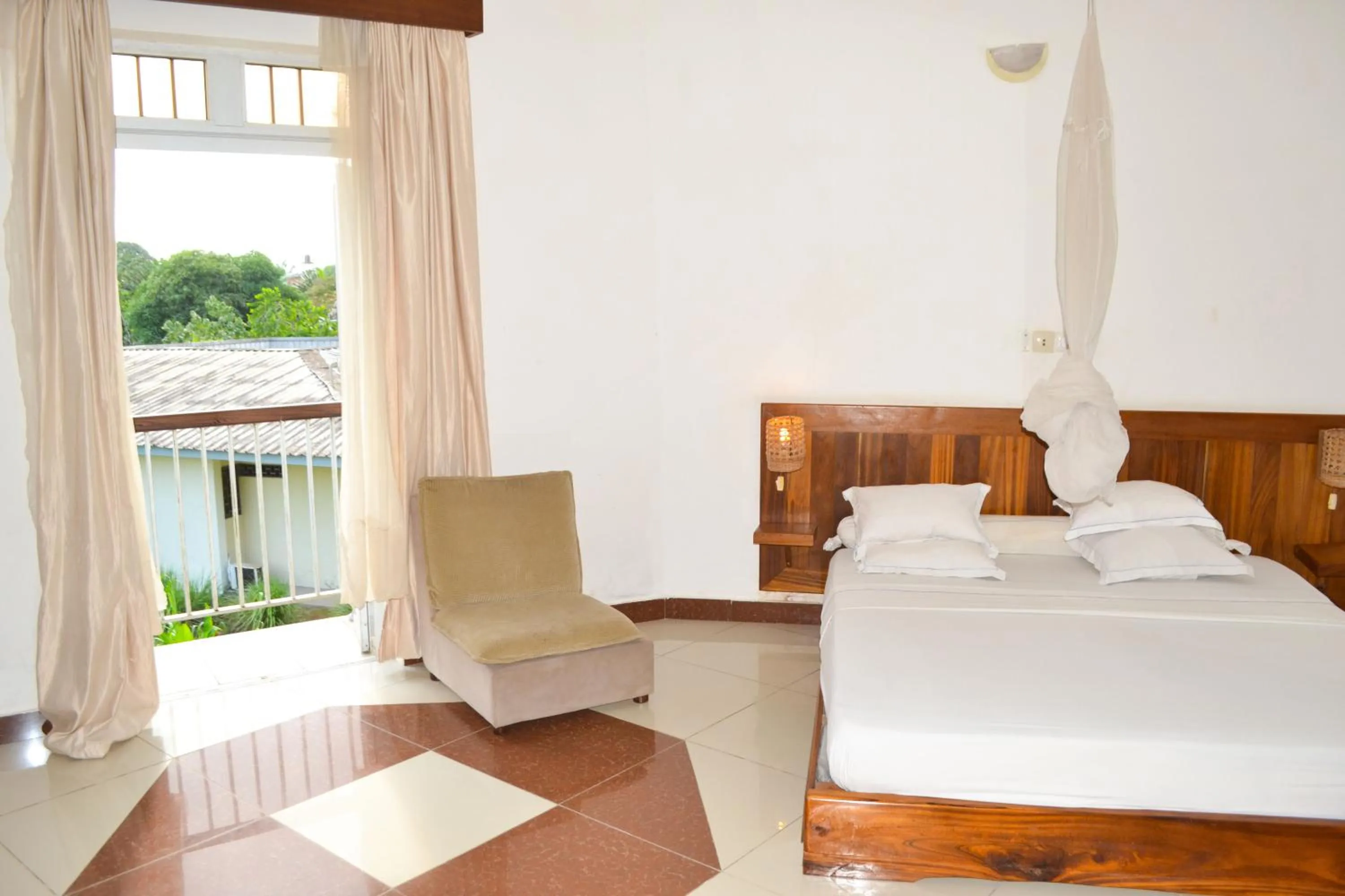 Bed in Hôtel Framotel Kribi