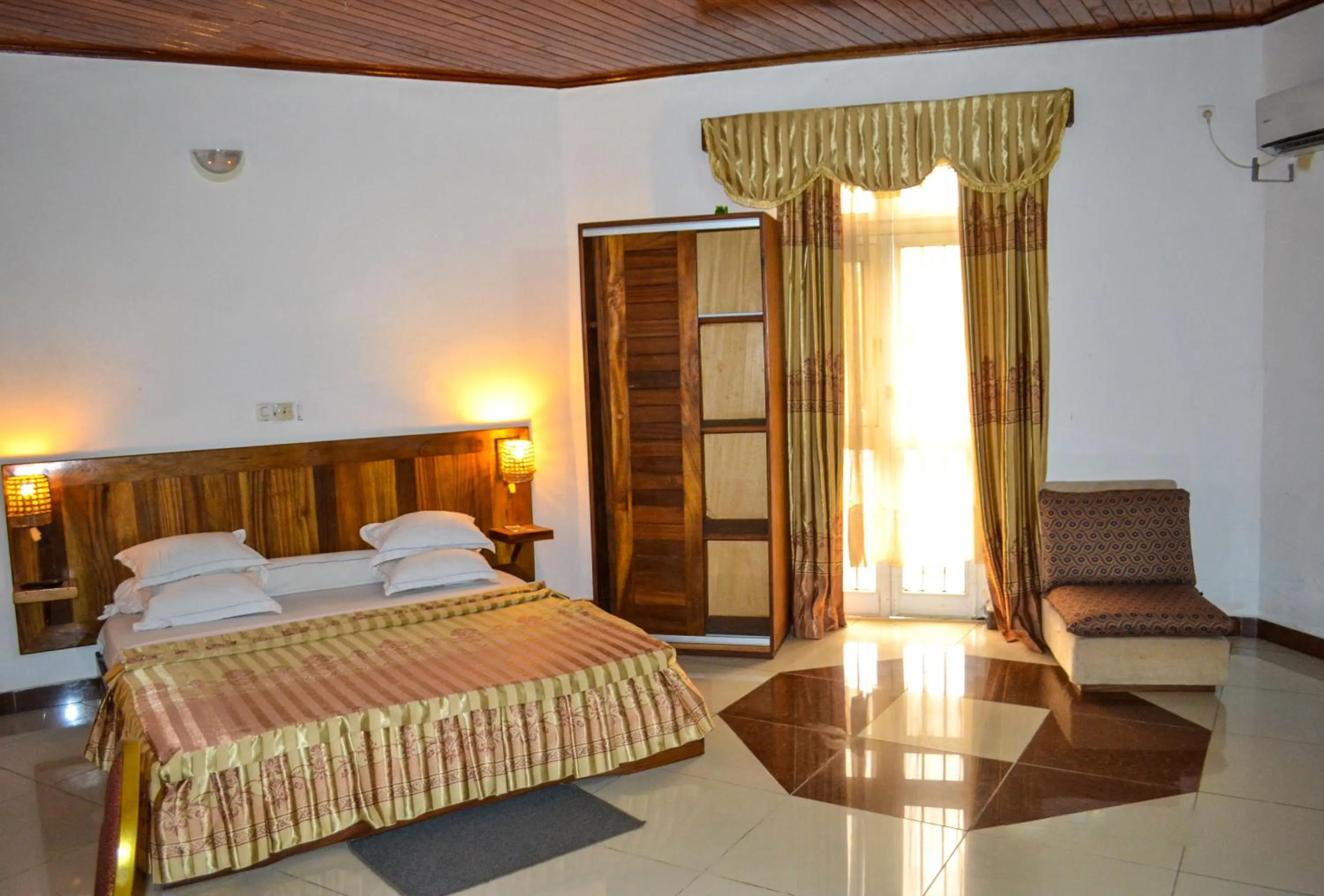 Bed in Hôtel Framotel Kribi