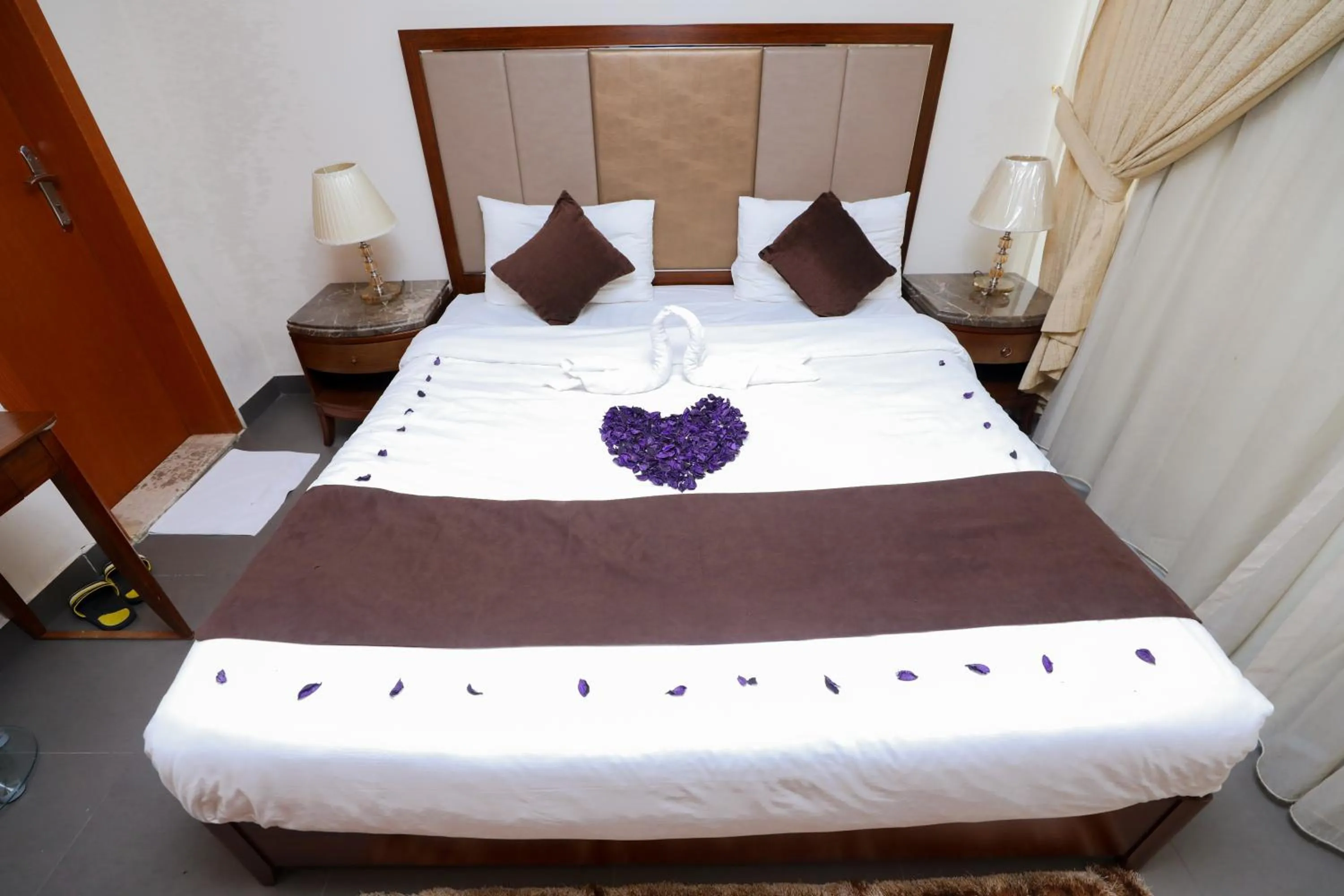 Bed in ماجيك سويت ابوحليفة Magic Suite Abu Halifa