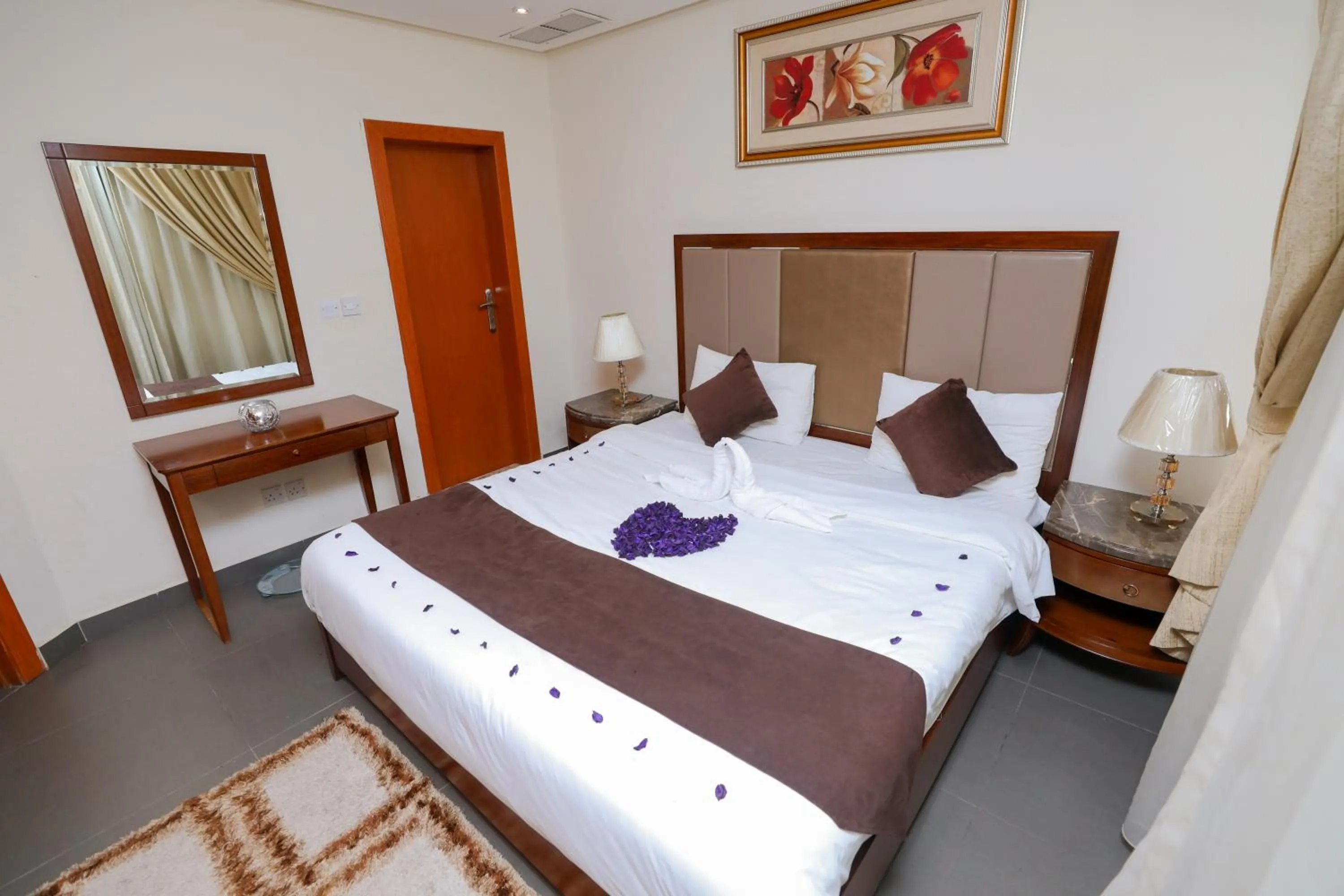 Bed in ماجيك سويت ابوحليفة Magic Suite Abu Halifa