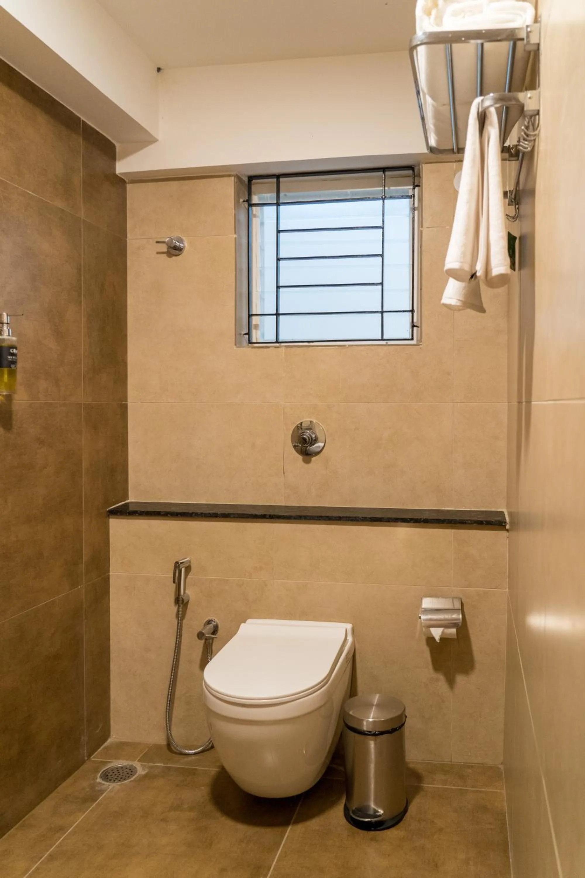 Toilet in Olive Hotel Millers Road by Embassy Group