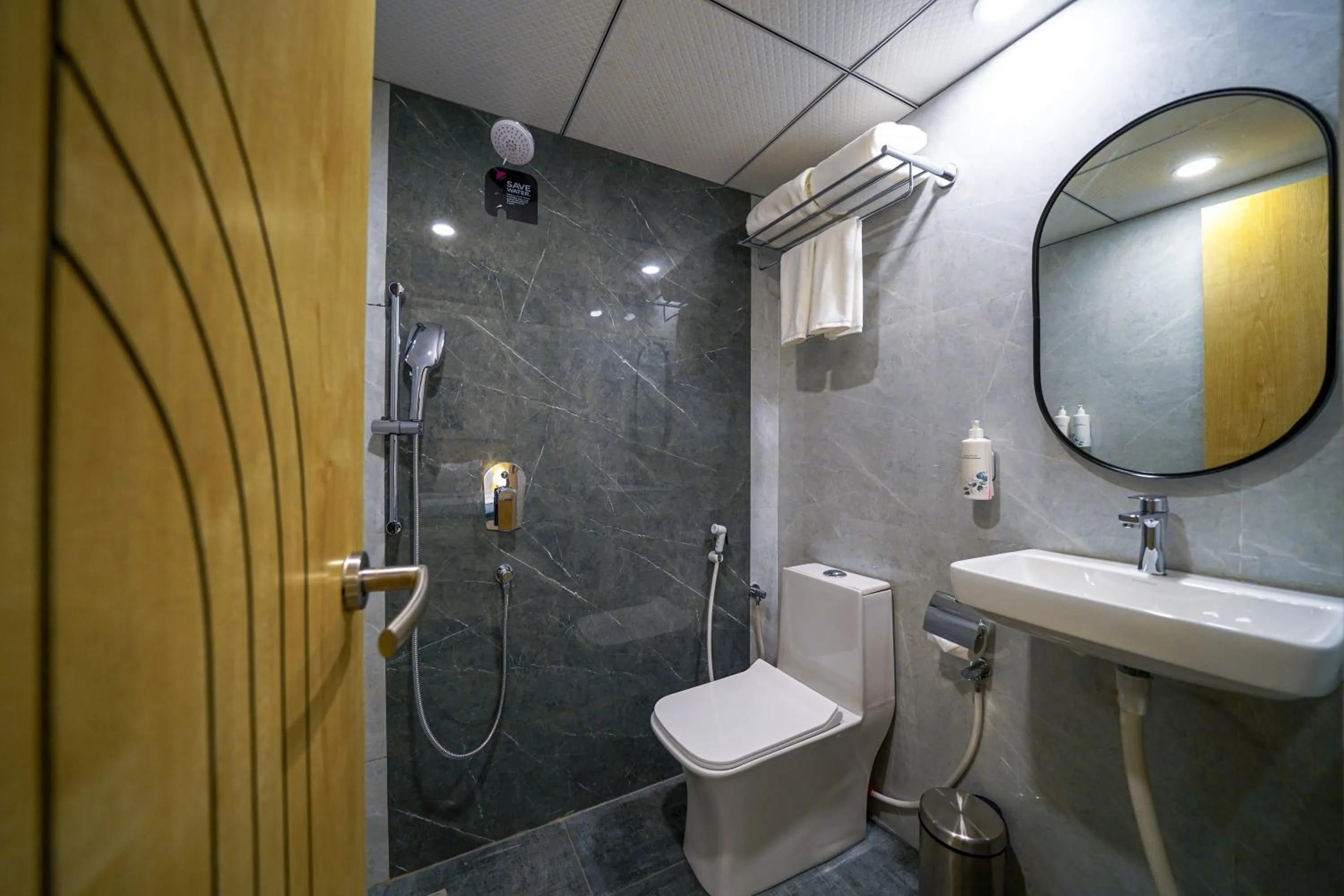 Bathroom in Olive Hotel Kundalahalli by Embassy Group