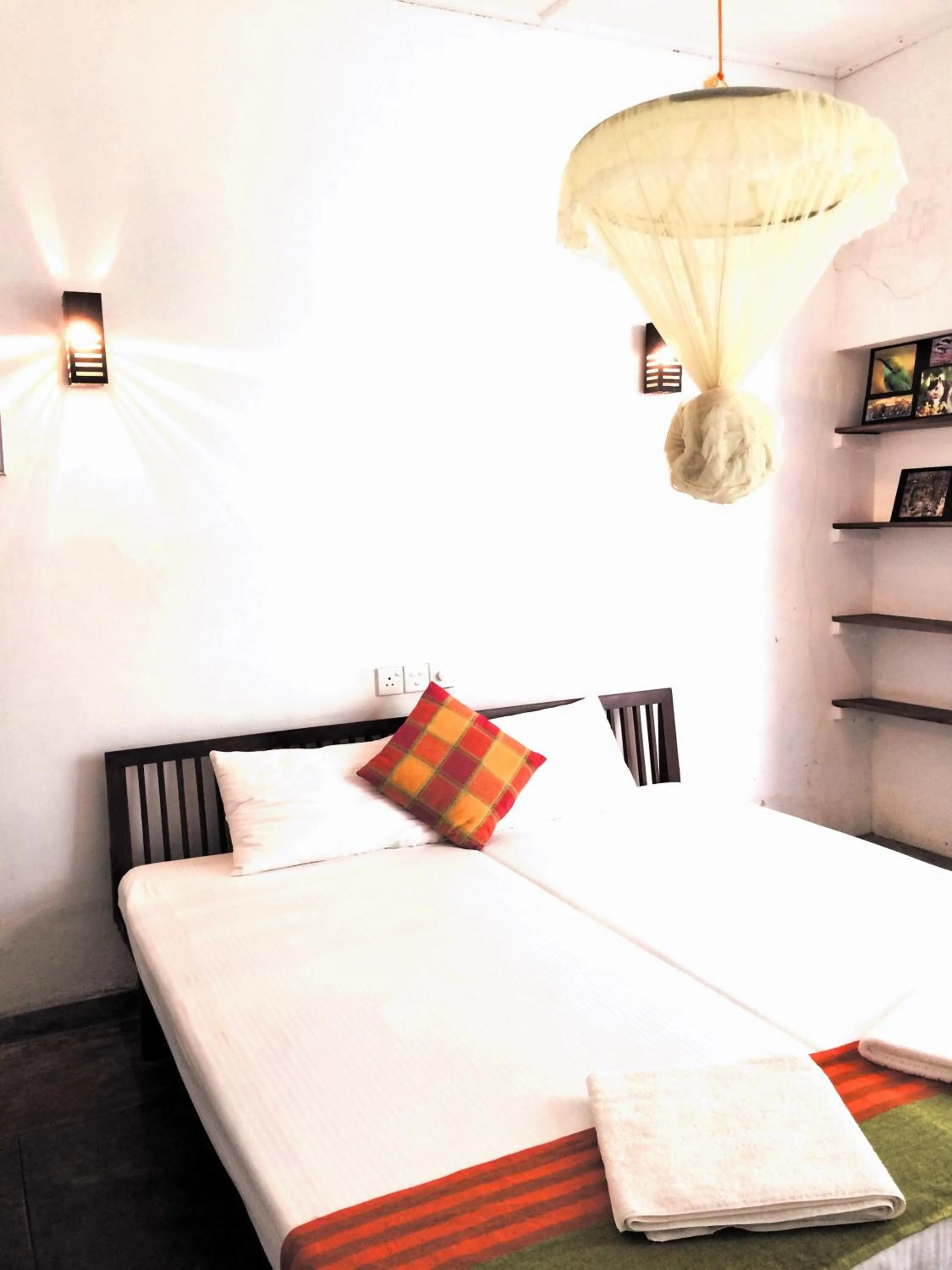 Bed in Curry Bowl Restaurant & Turtles Rest