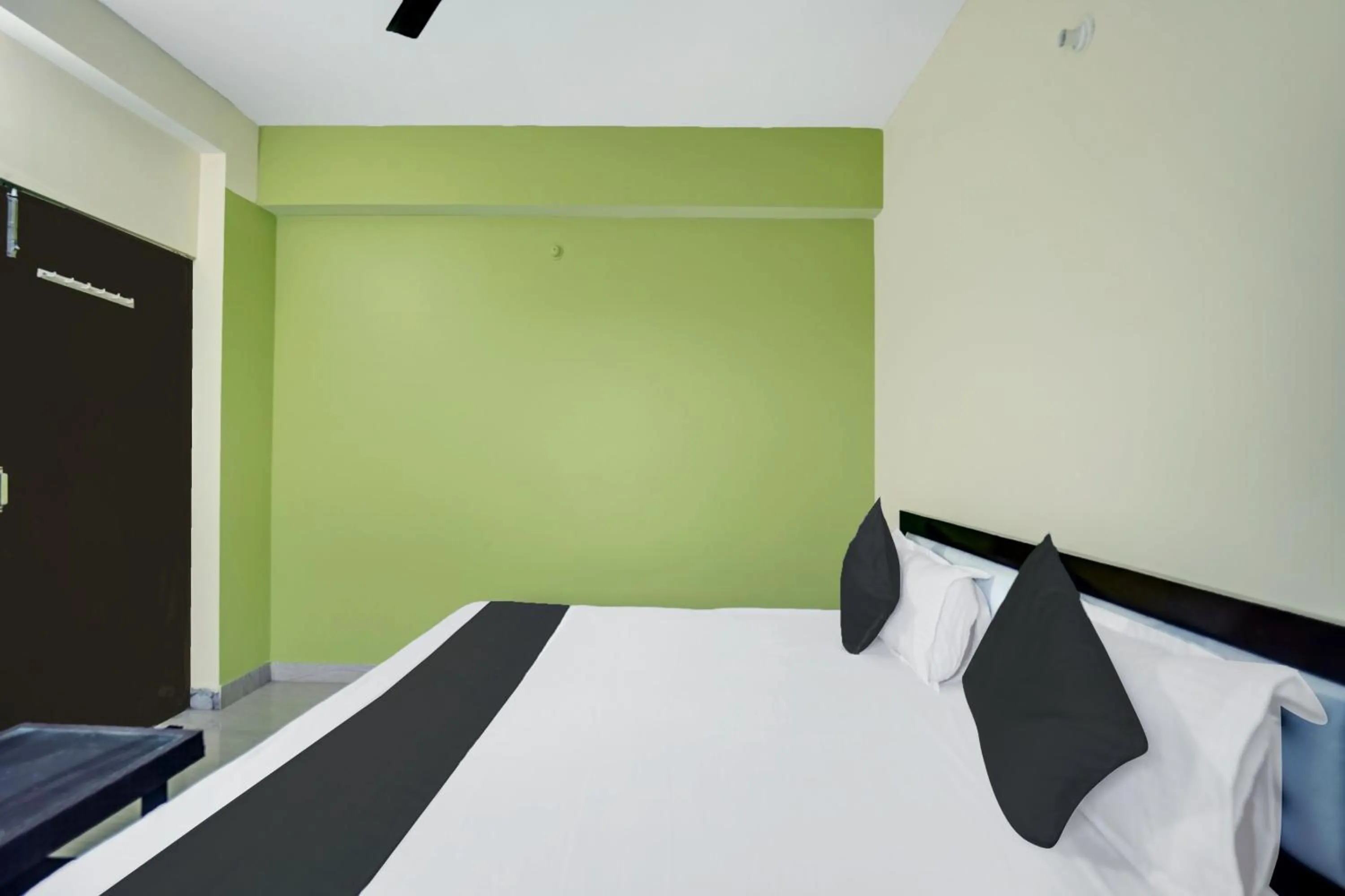 Bed in Hotel Johar Inn