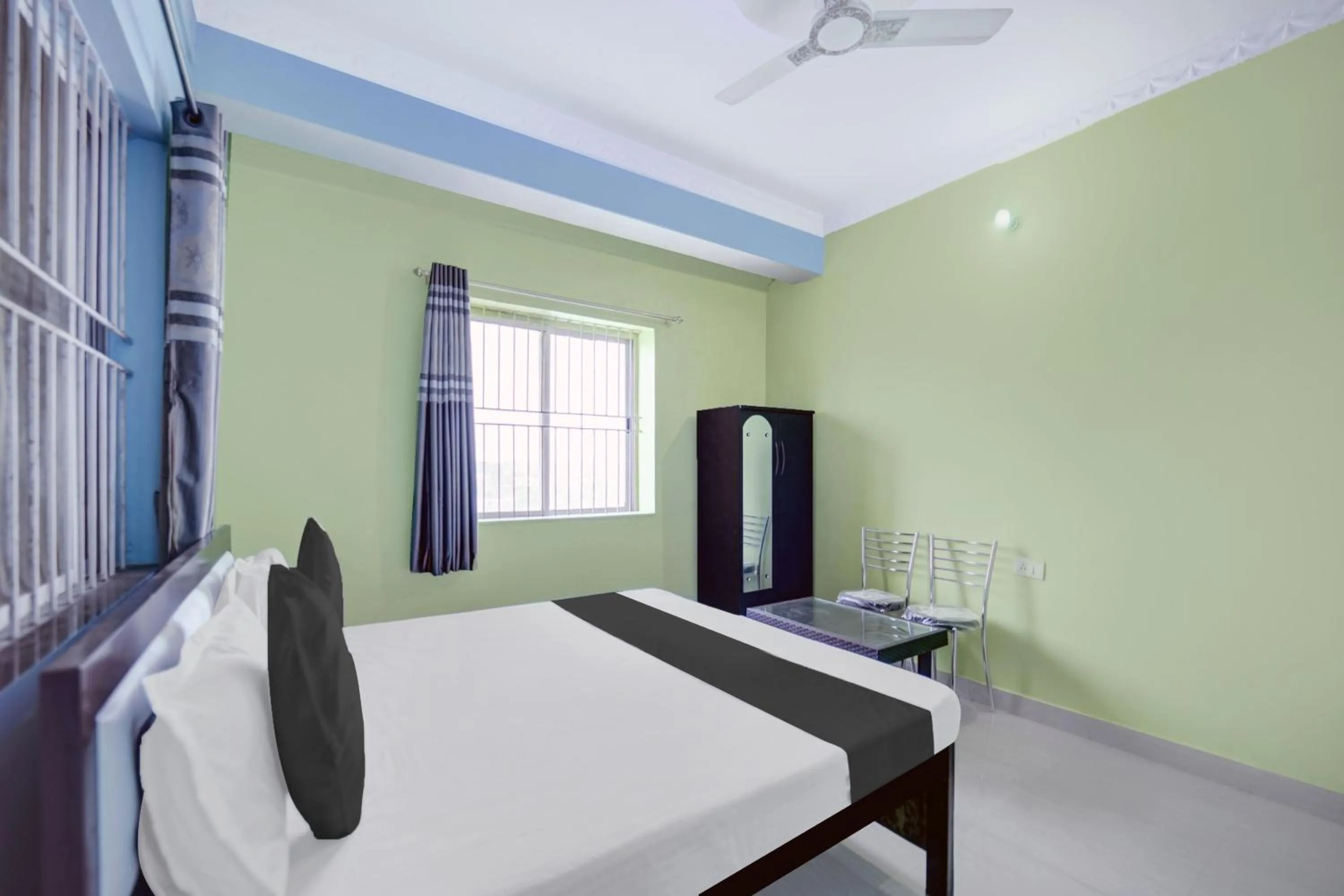 Bed in Hotel Johar Inn