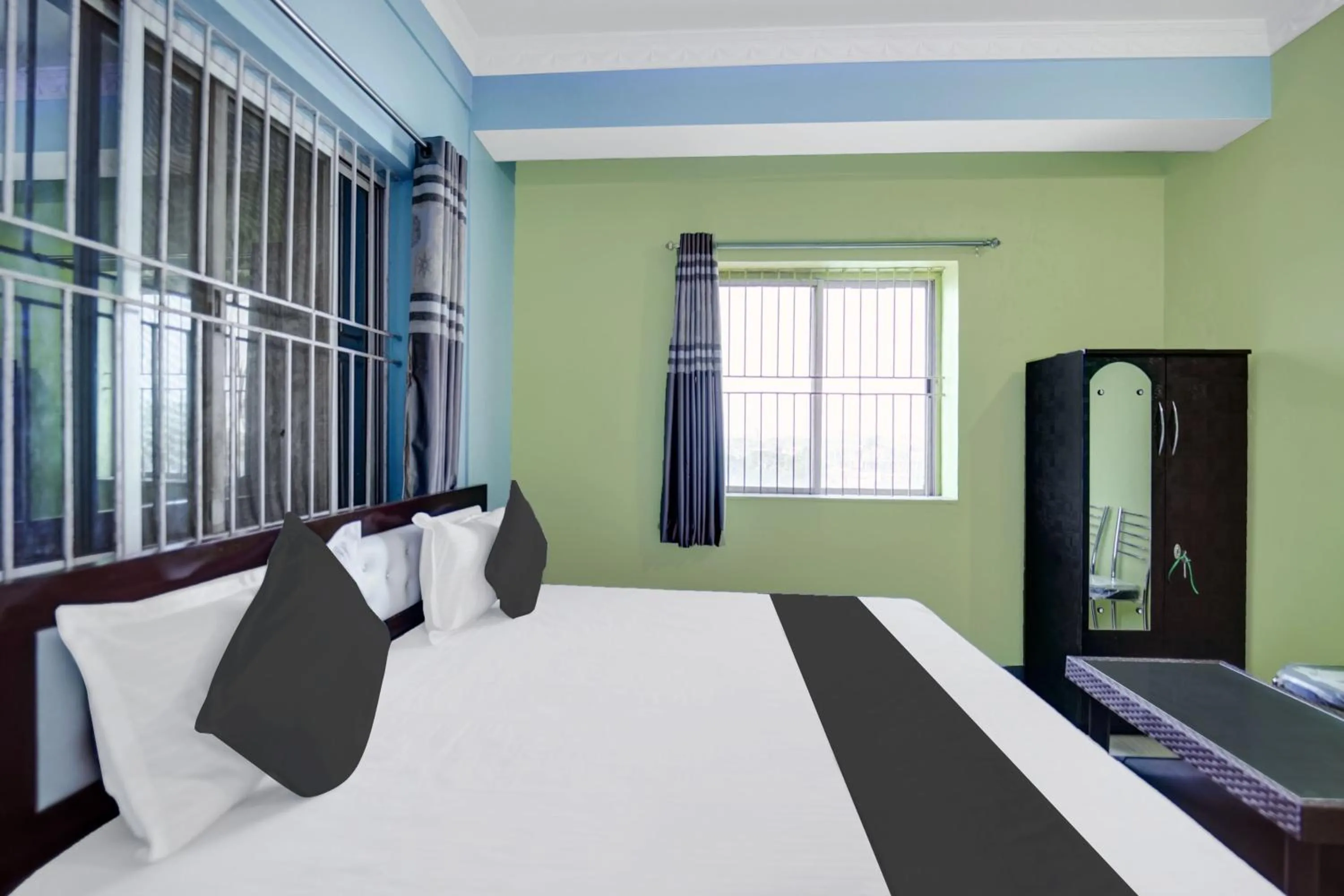 Bed in Hotel Johar Inn