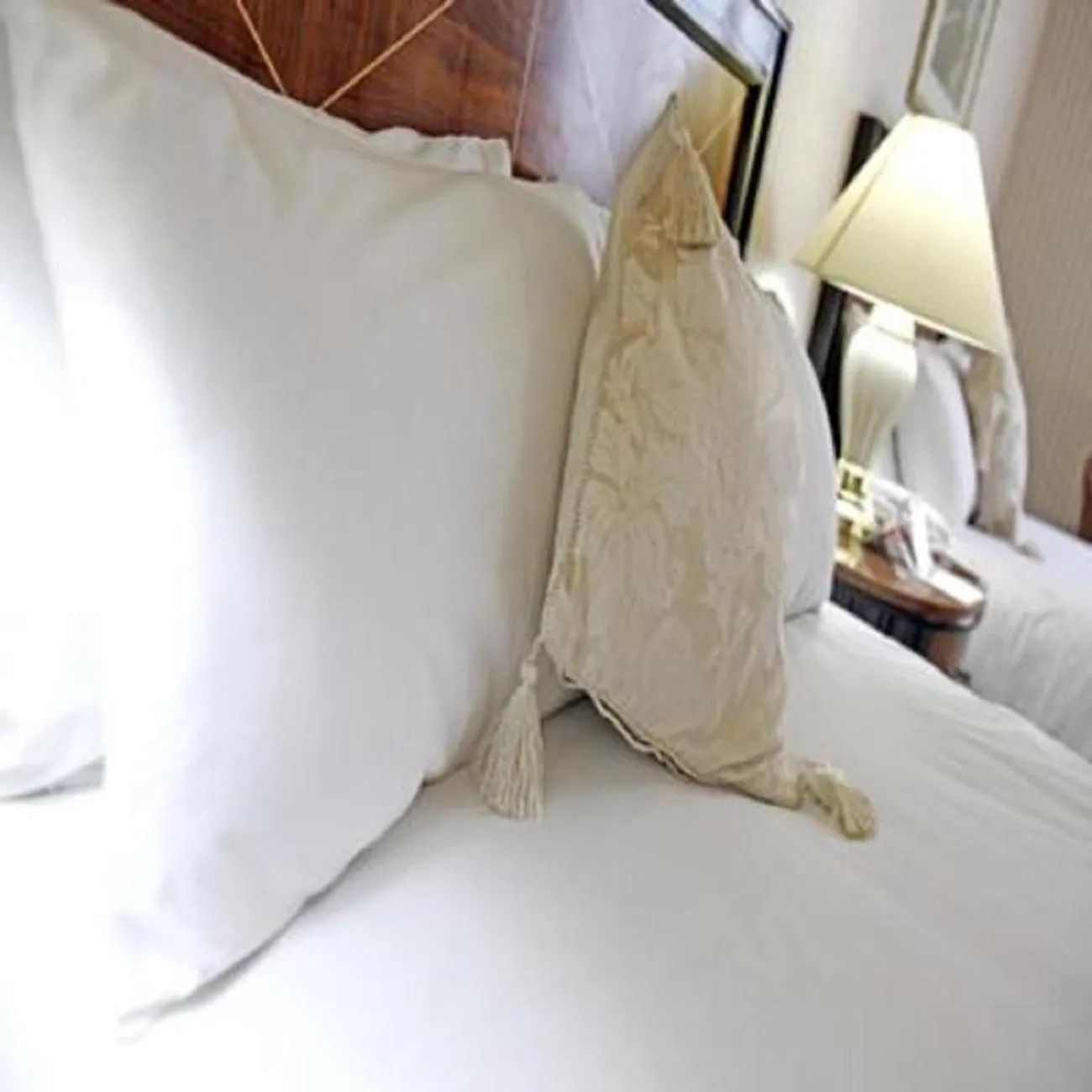 Bed in Royal Court Hotel