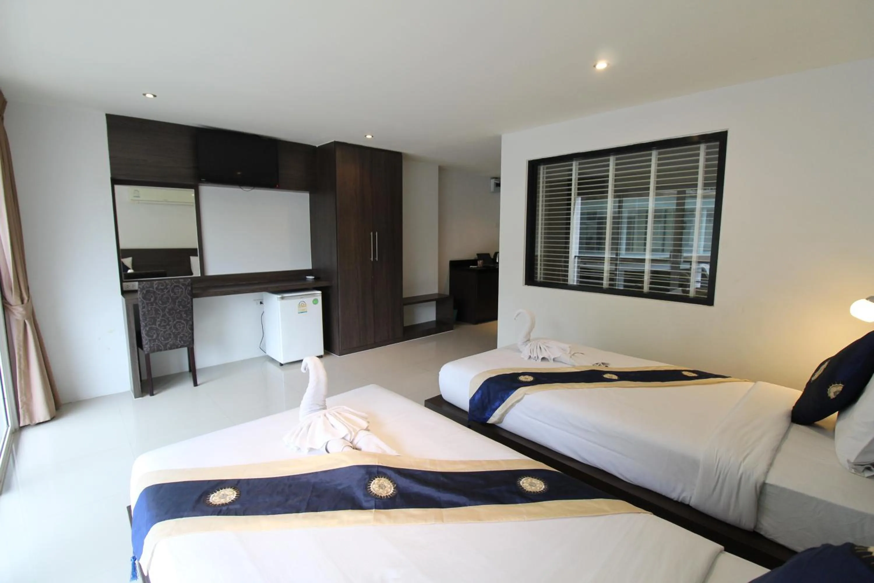 Bed in Ocean View Treasure Residence