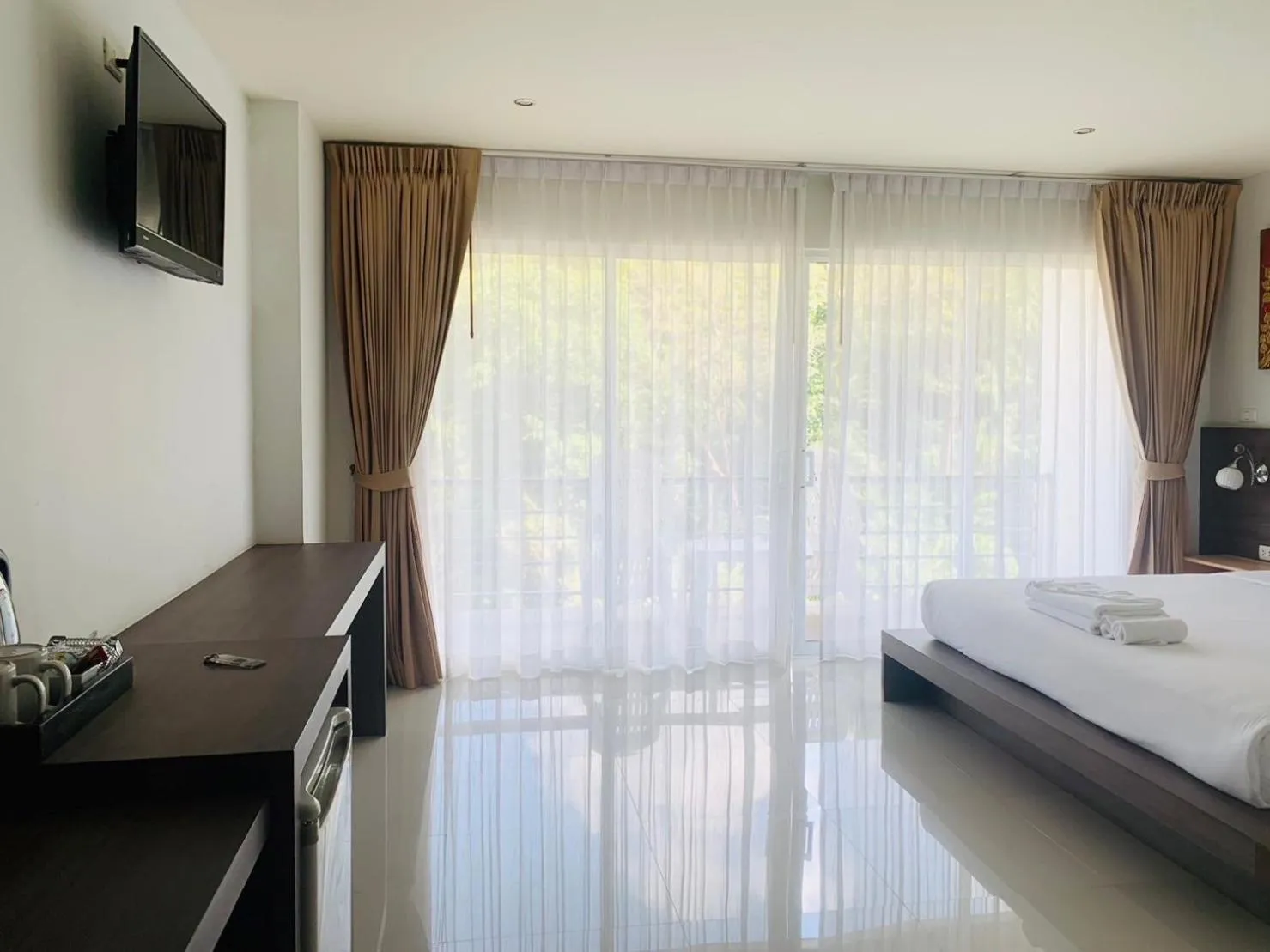 Bed in Ocean View Treasure Residence